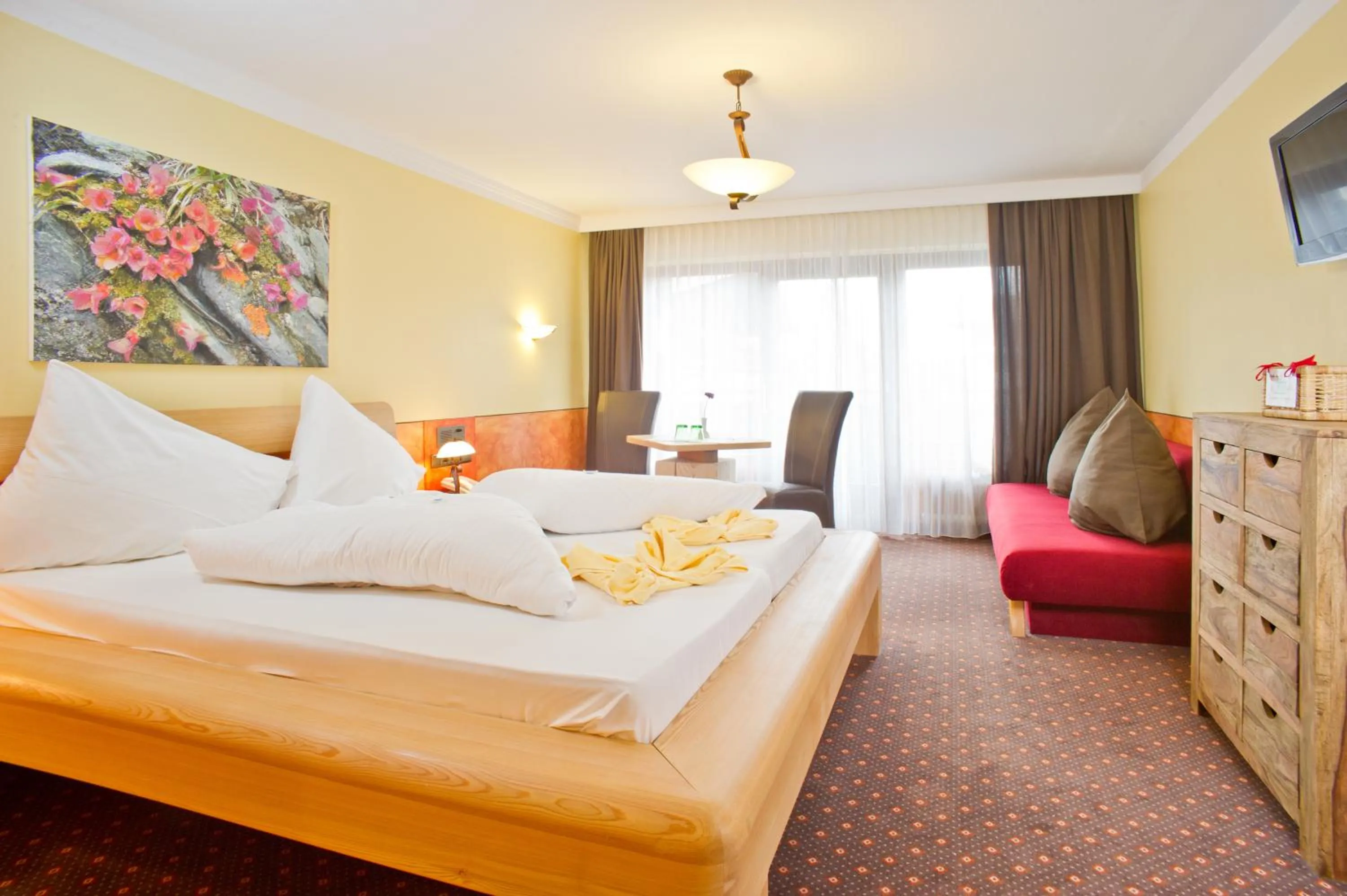 Bed in Hotel Hochfilzer