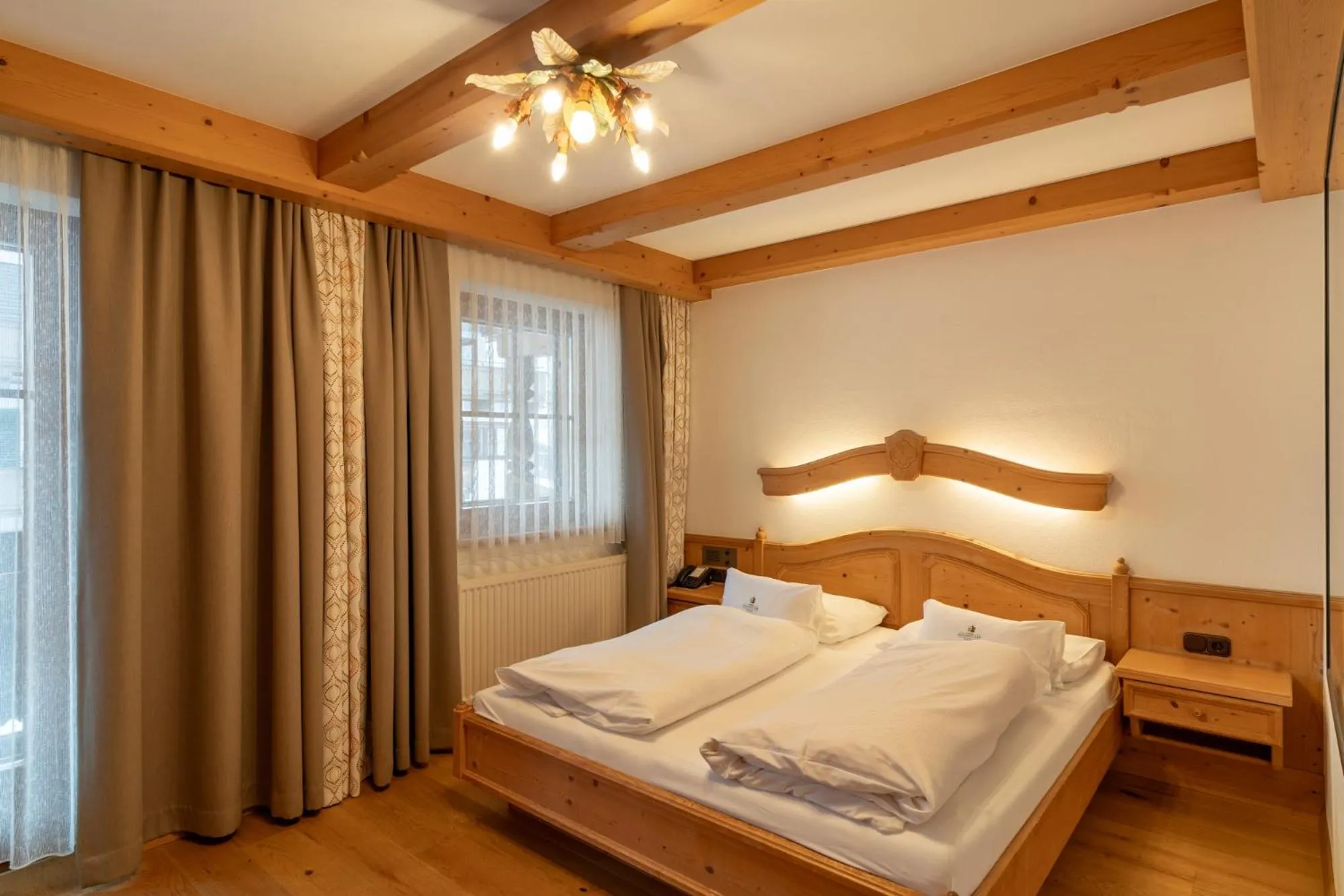 Bed in Hotel Hochfilzer