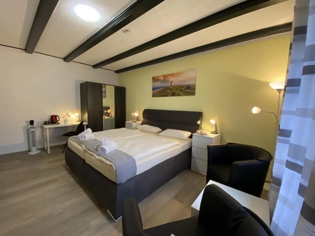 Bed in Hotel Ammerländer Stuben