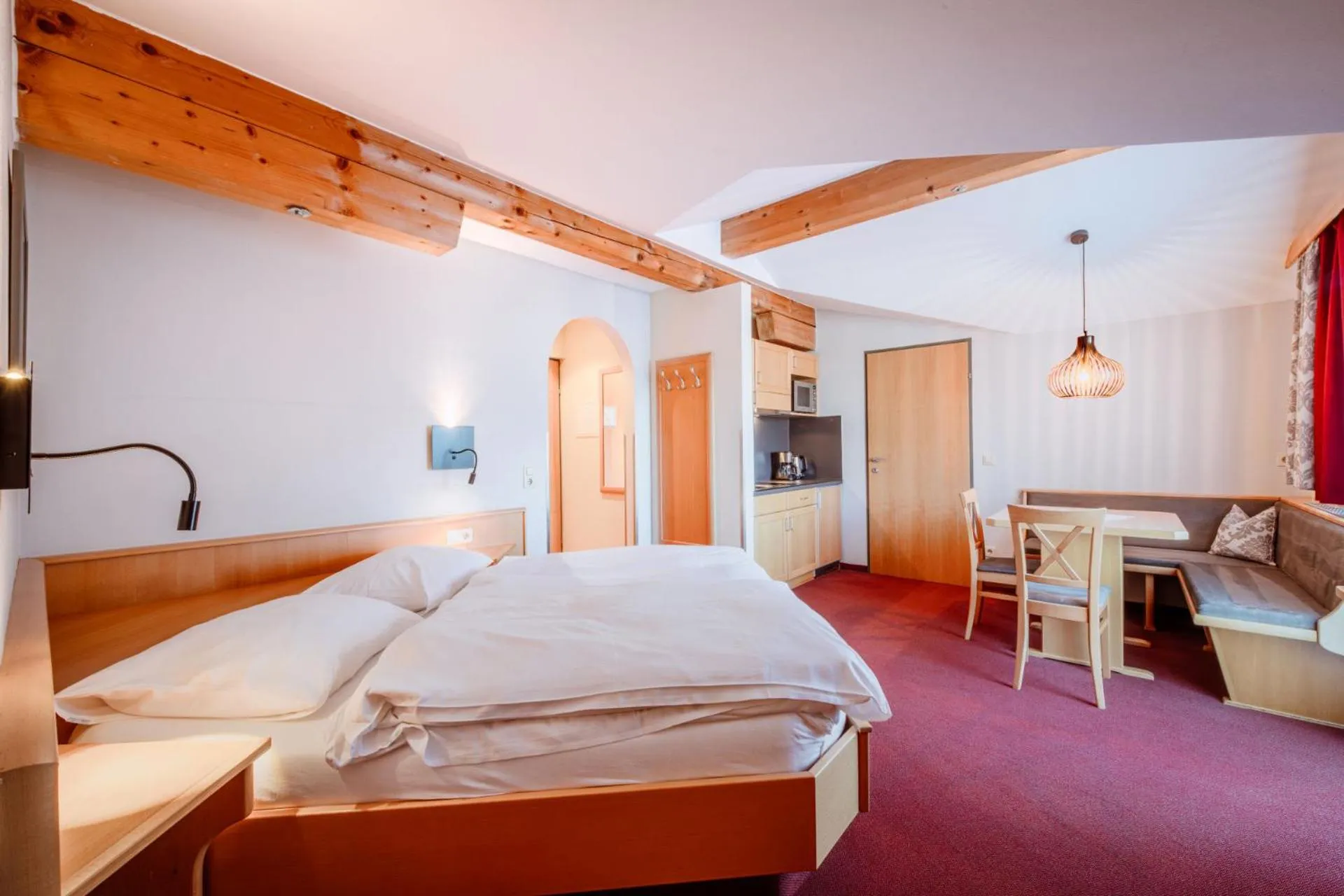 Dining area, Bed in Harmls Aparthotel