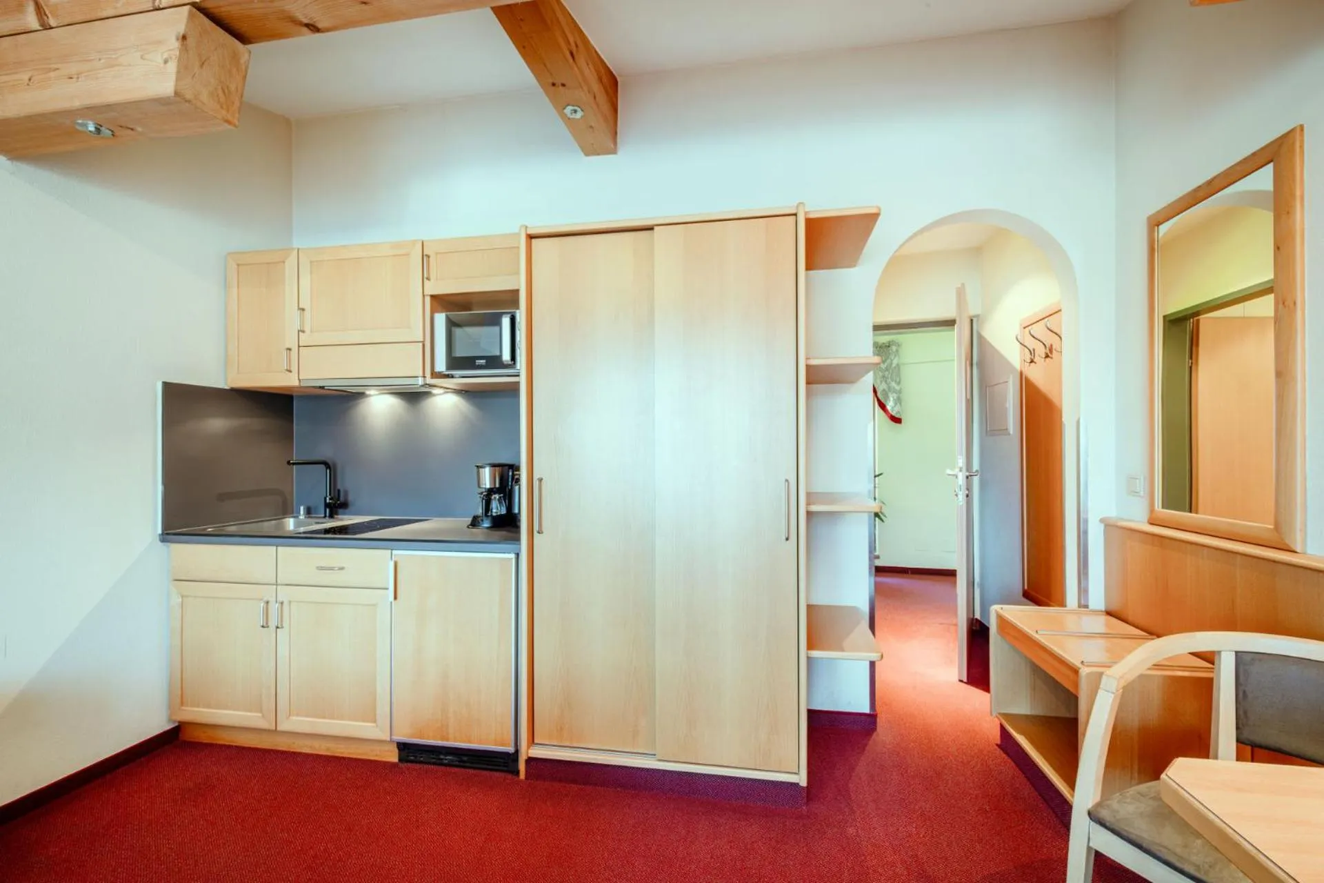 Kitchen or kitchenette in Harmls Aparthotel
