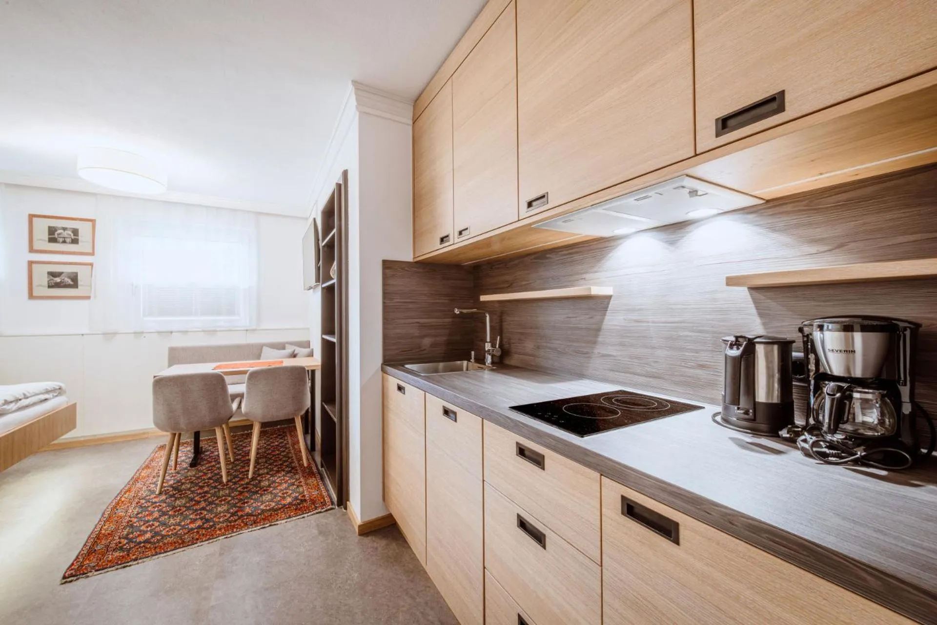 Kitchen or kitchenette in Harmls Aparthotel
