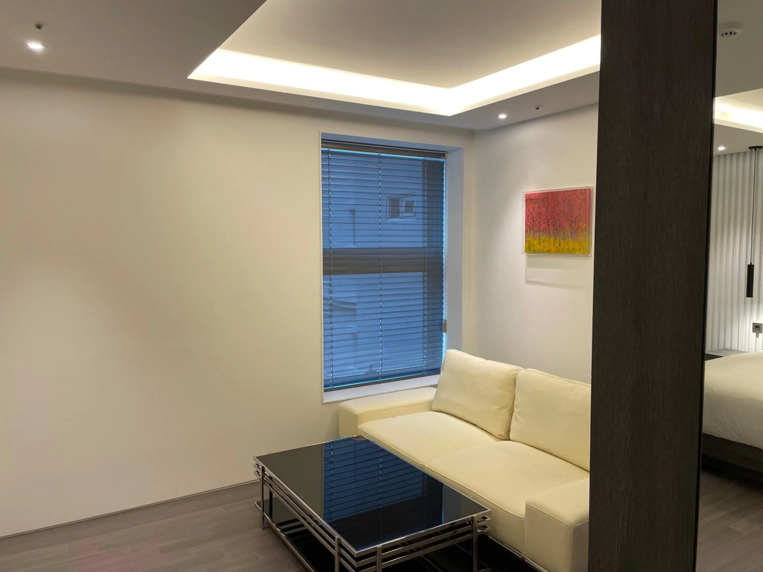 Living room, Bed in AG405 Hotel