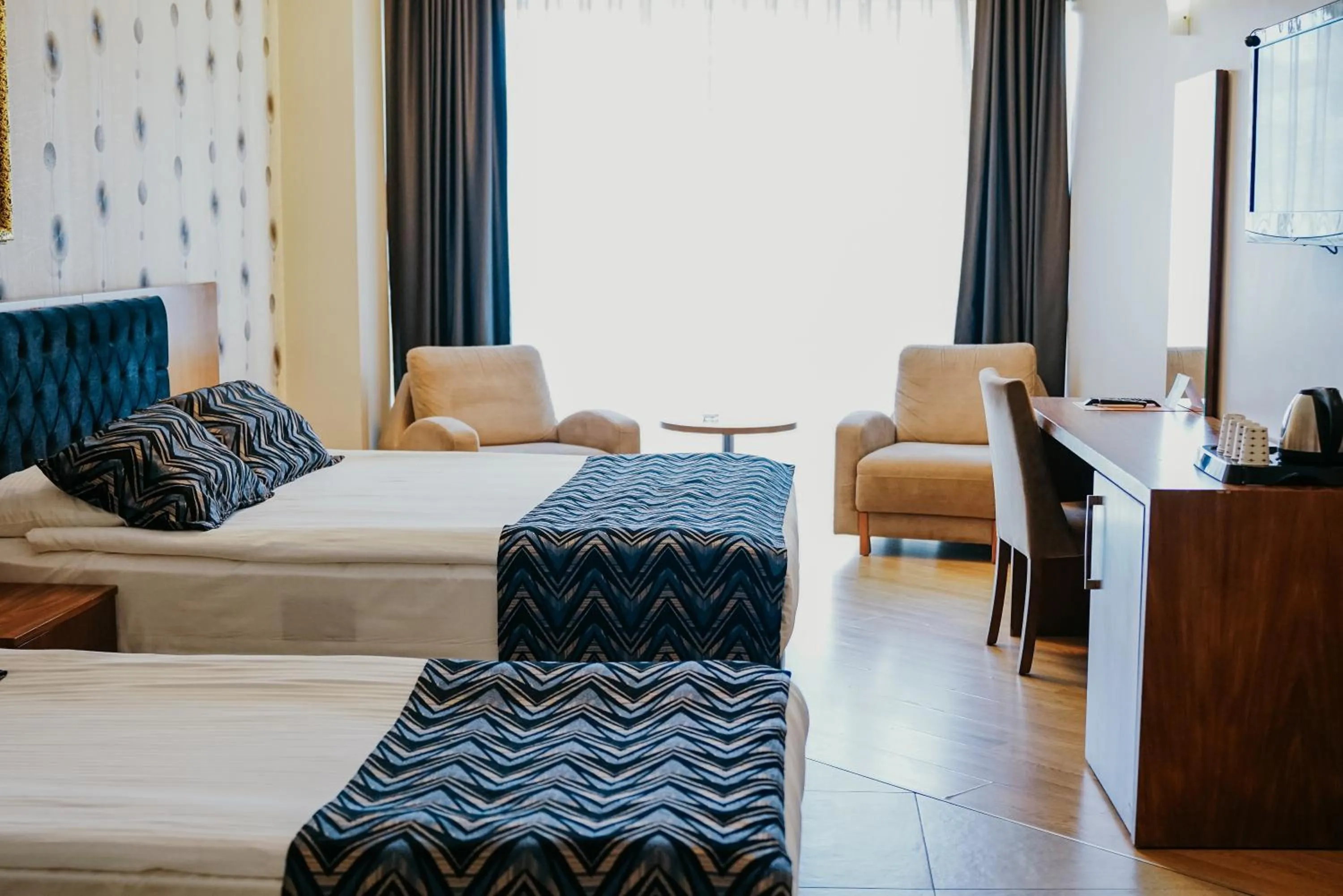 Communal lounge/ TV room in Grand Karot Hotel