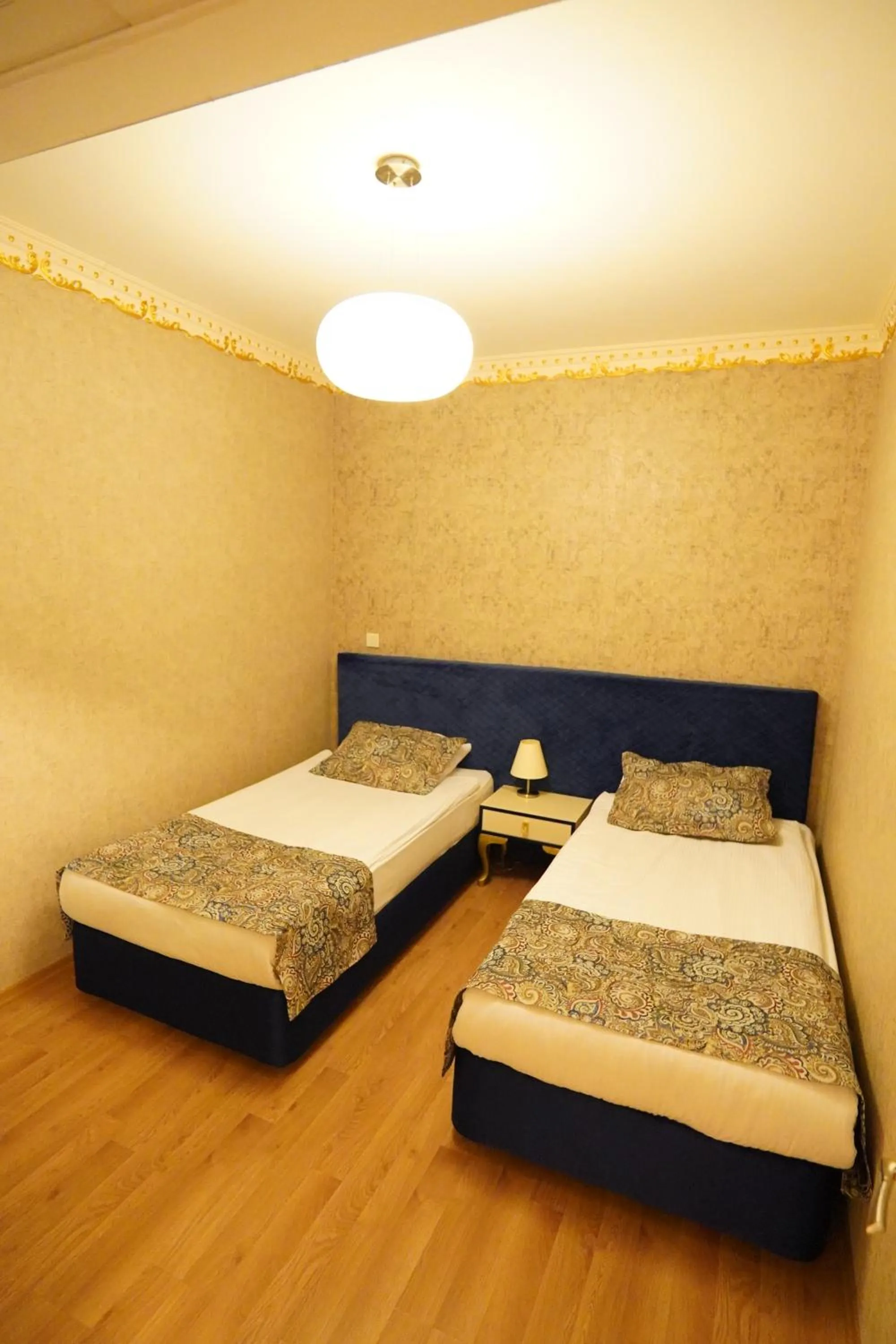 Bed in Grand Karot Hotel