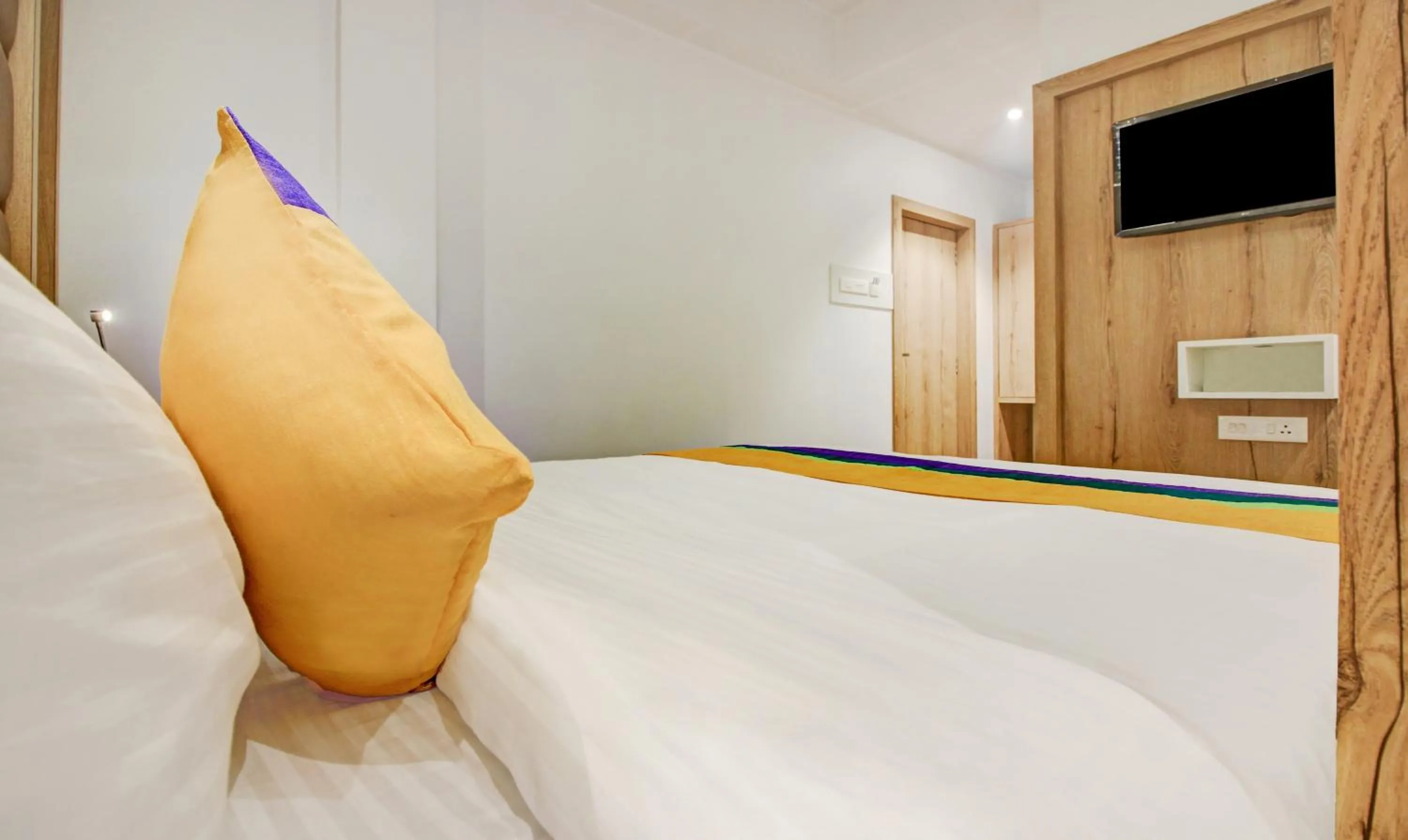 Bed in Hotel Aarush Inn