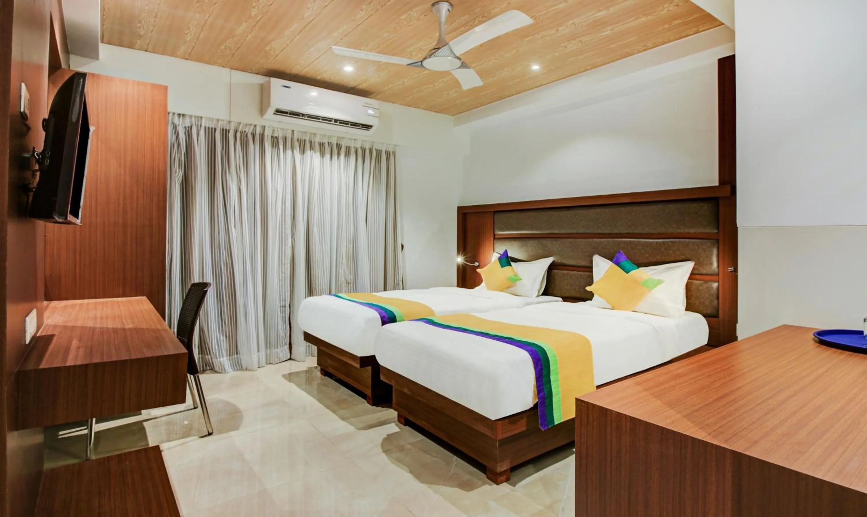 Bed in Hotel Aarush Inn