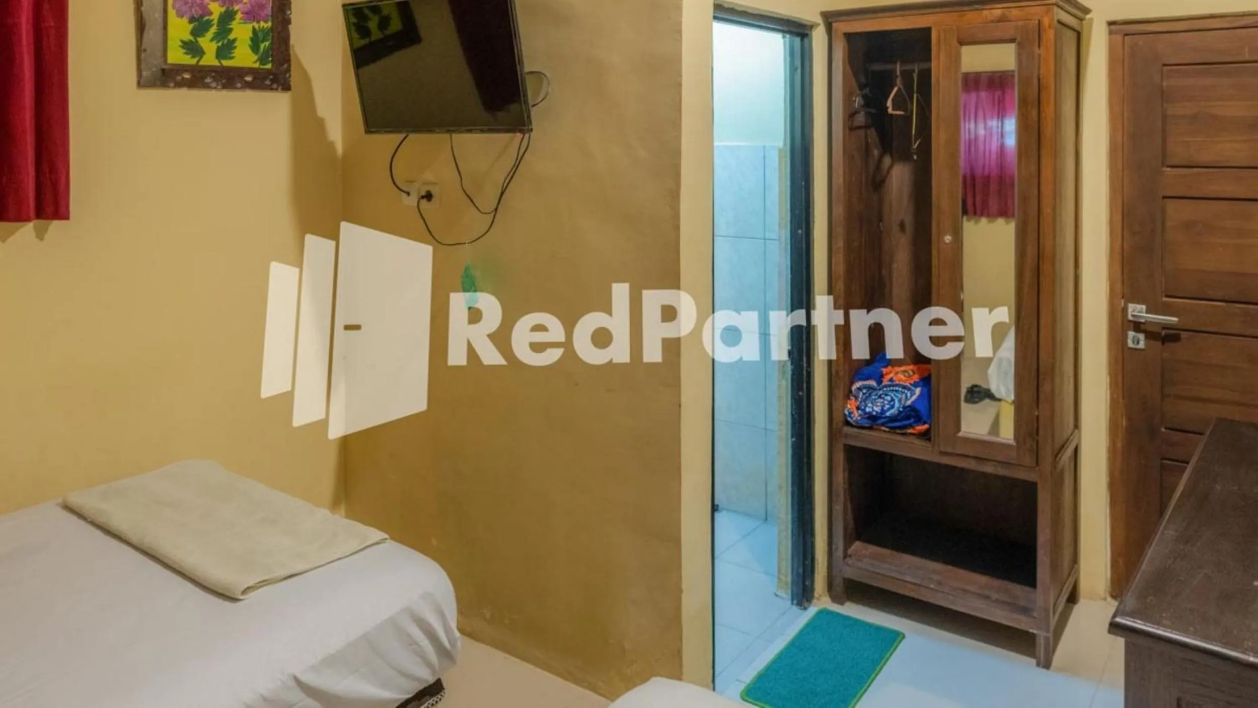 Bathroom, Bed in Vandhela Homestay Syariah Mitra RedDoorz