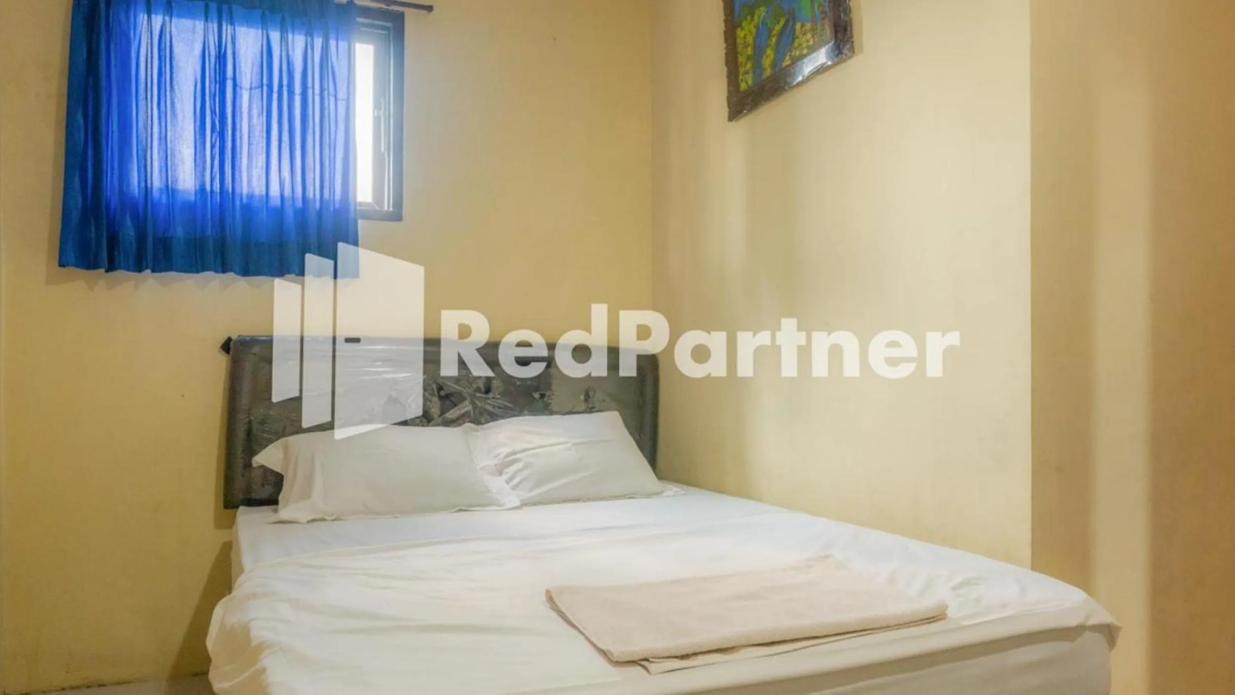 Bed in Vandhela Homestay Syariah Mitra RedDoorz