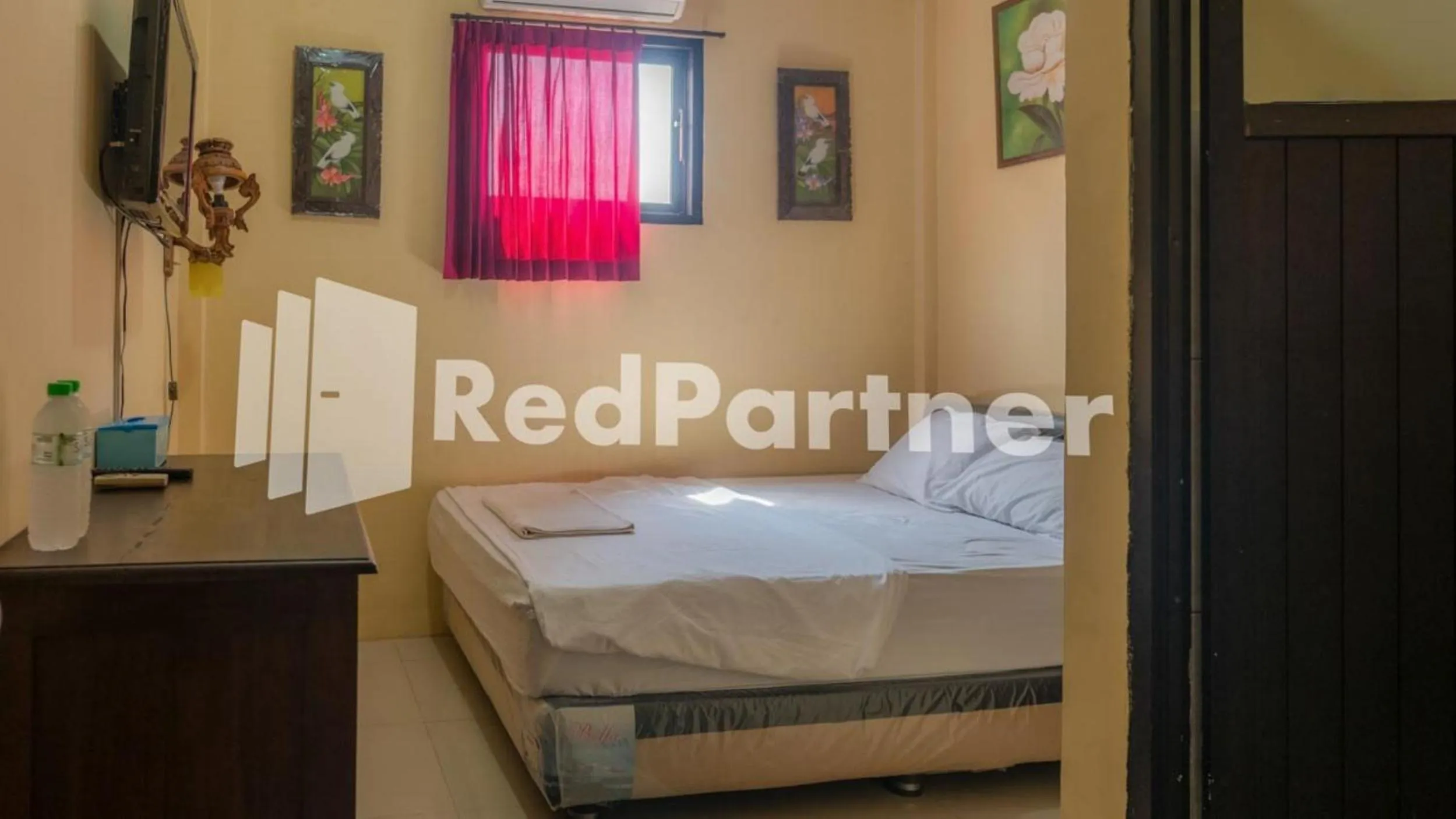 Bed in Vandhela Homestay Syariah Mitra RedDoorz