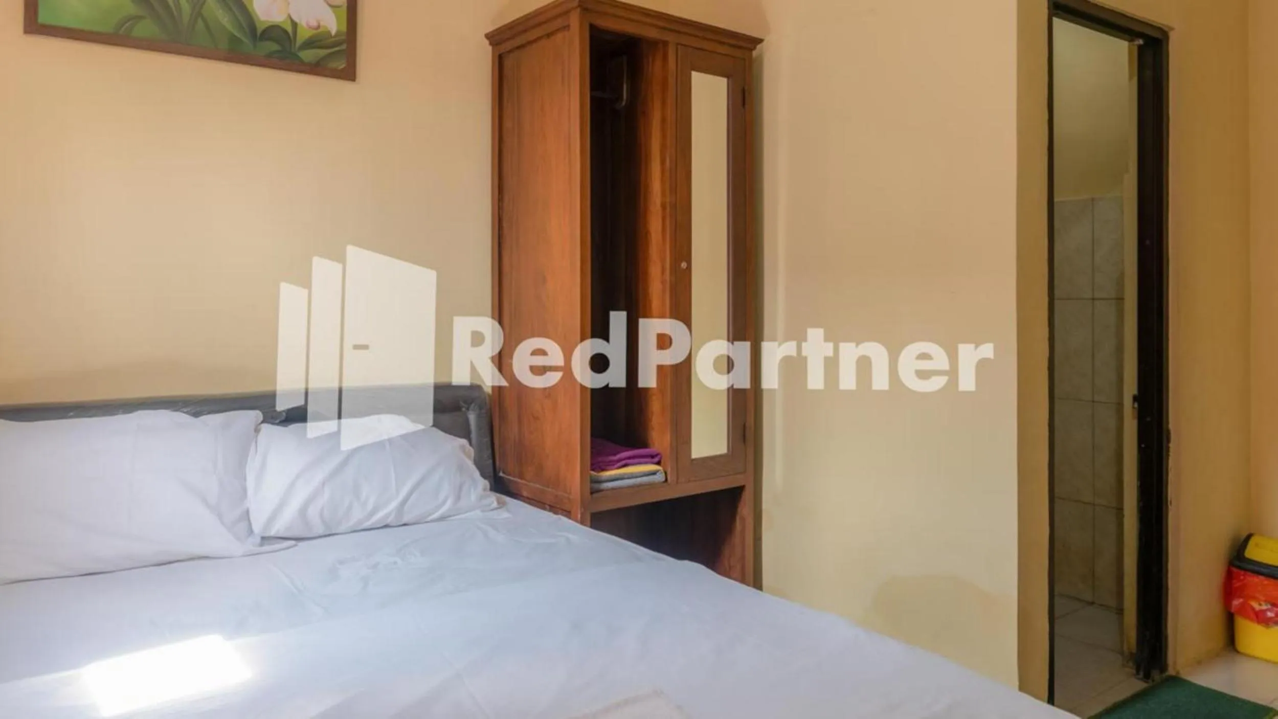 Bed in Vandhela Homestay Syariah Mitra RedDoorz