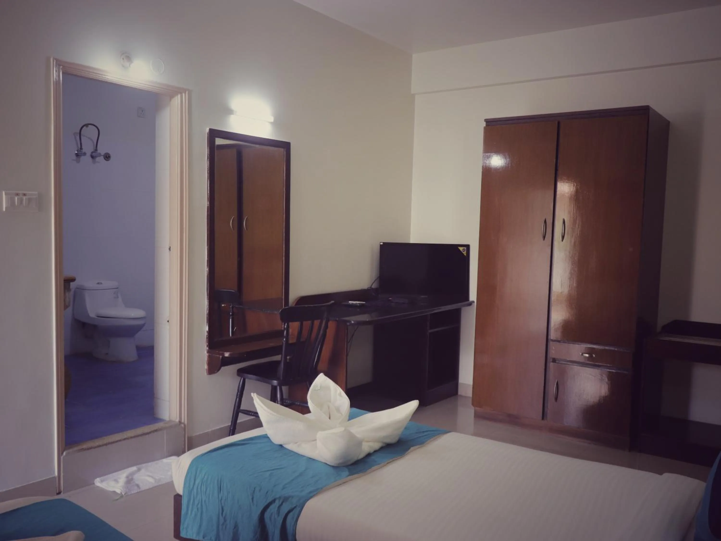 Toilet, Bed in The Green Path Eco Hotel