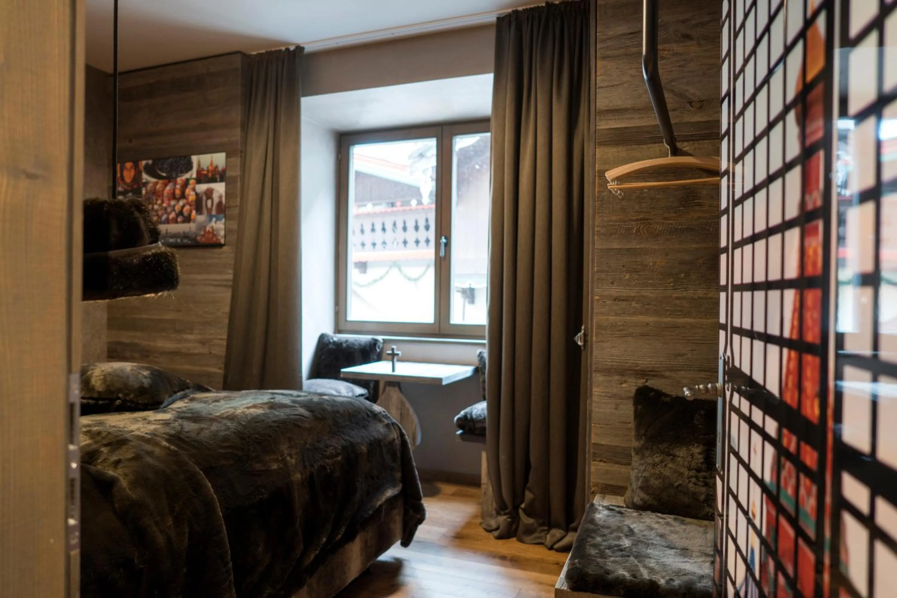 Photo of the whole room, Bed in Boutique Hotel im Auracher Löchl