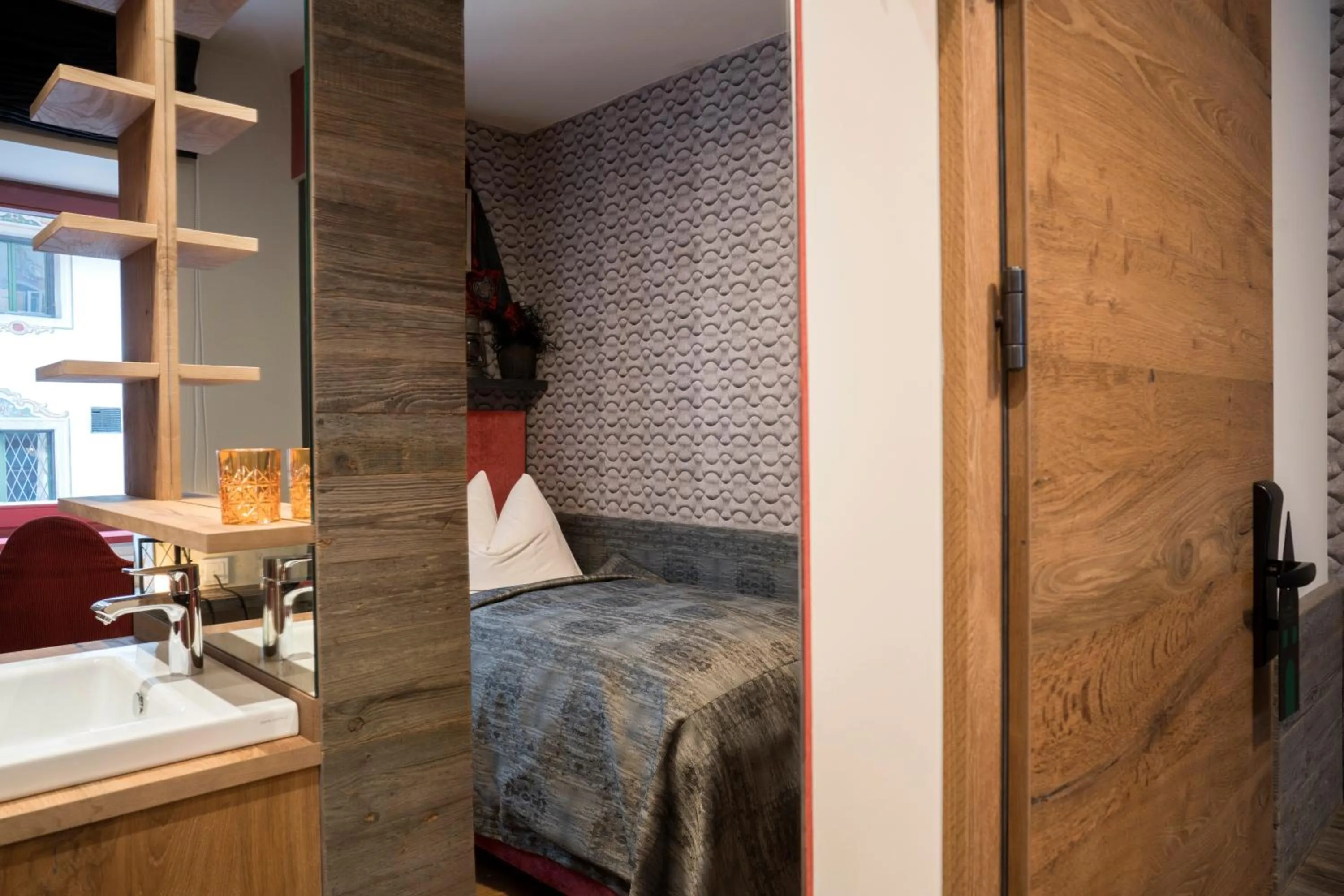 Photo of the whole room, Bed in Boutique Hotel im Auracher Löchl