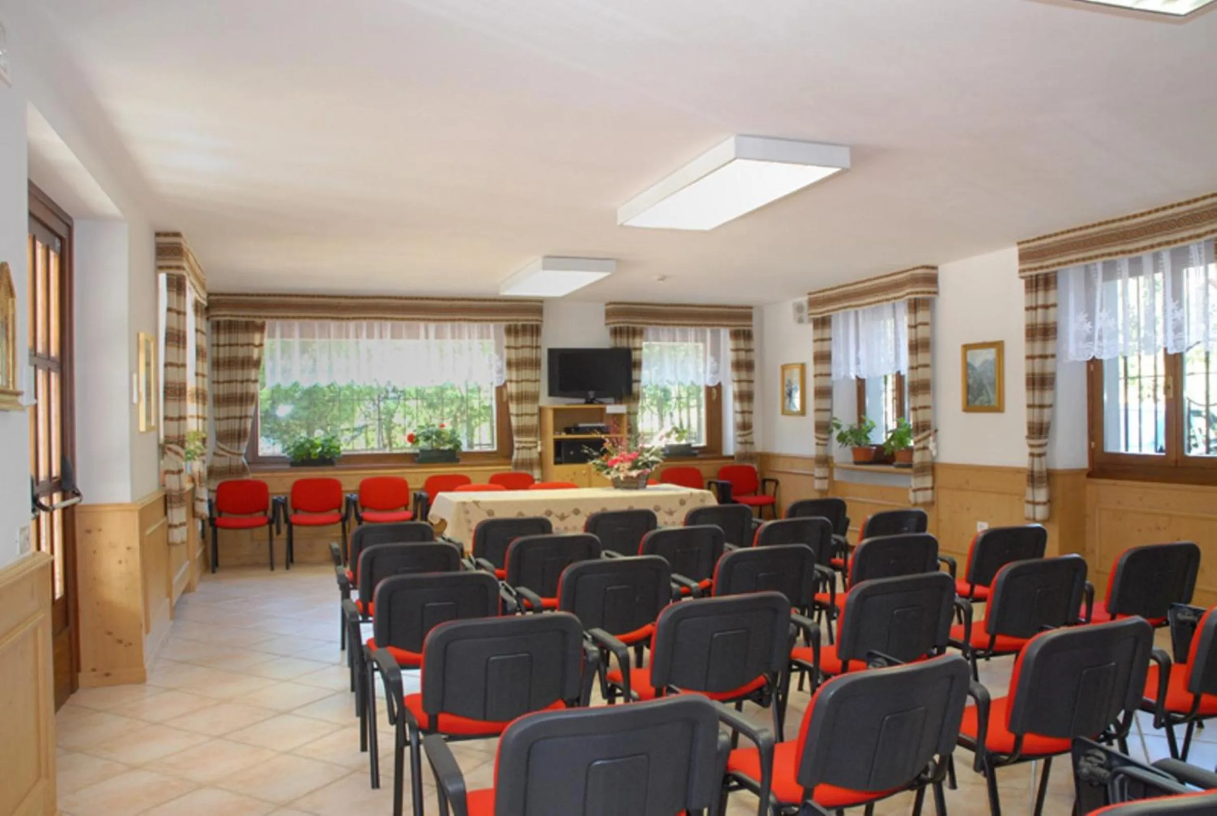 Communal lounge/ TV room in Casa Santa Maria