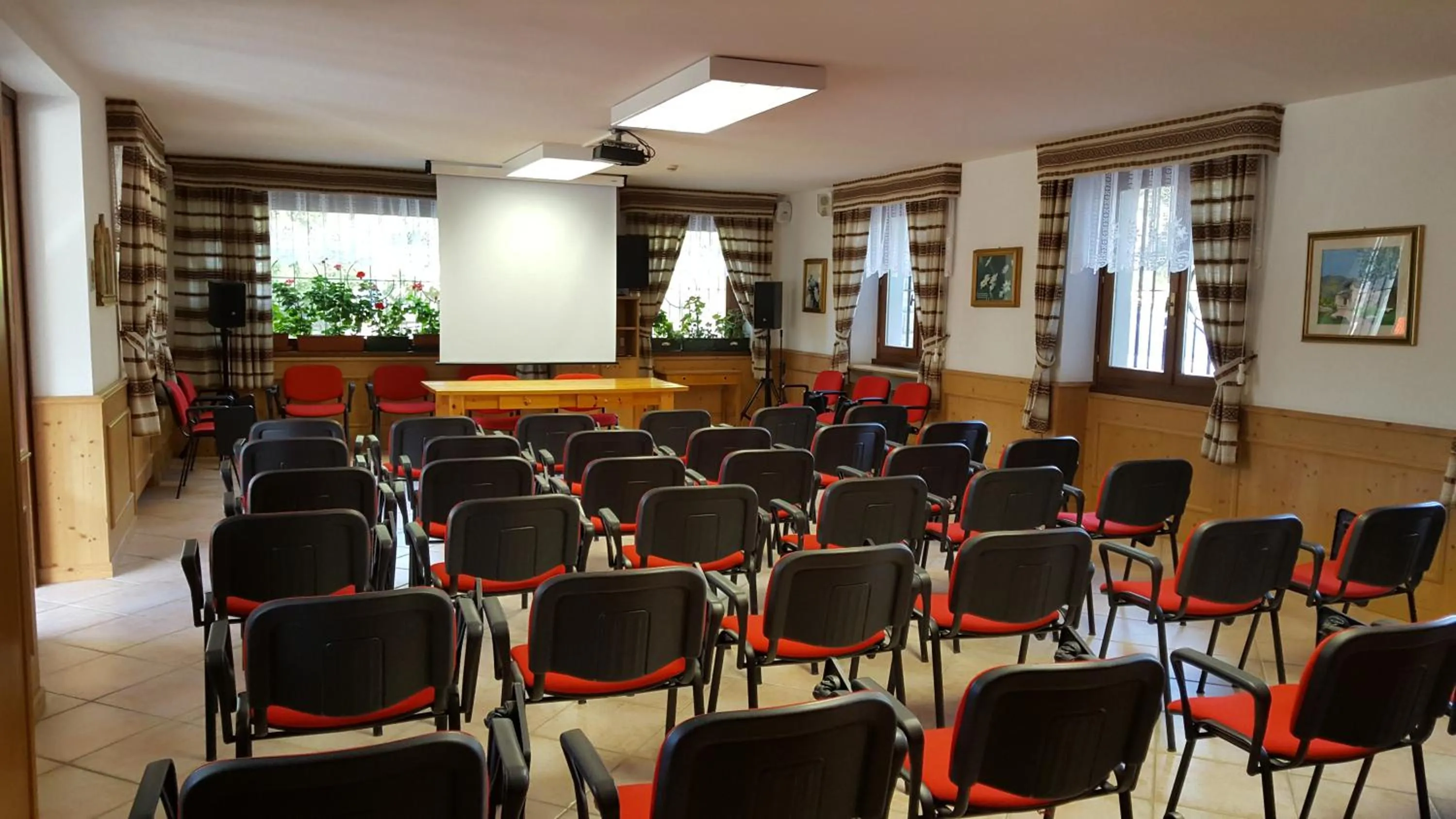 Communal lounge/ TV room in Casa Santa Maria