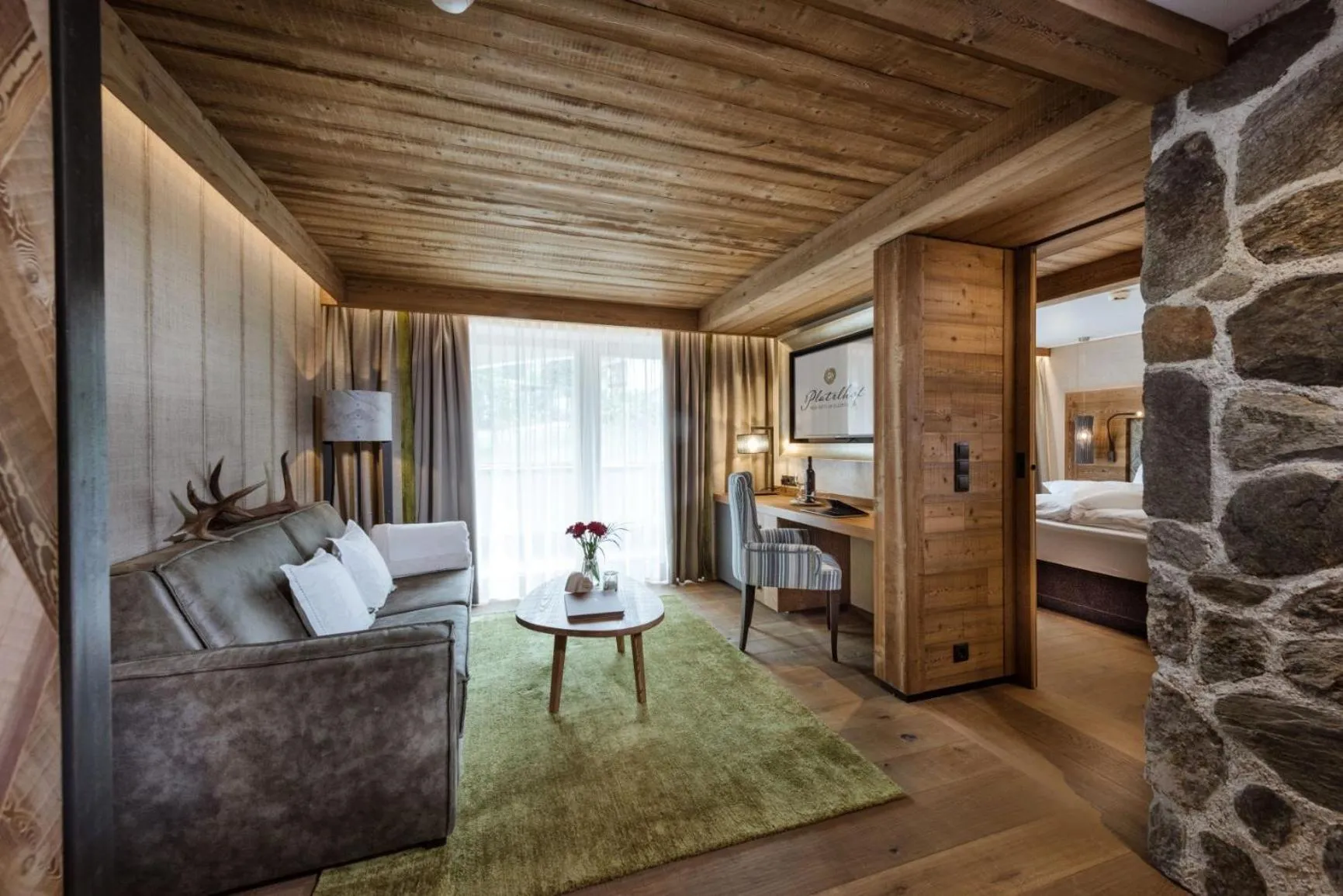 Photo of the whole room, Bed in Platzlhof - Mein Hotel im Zillertal