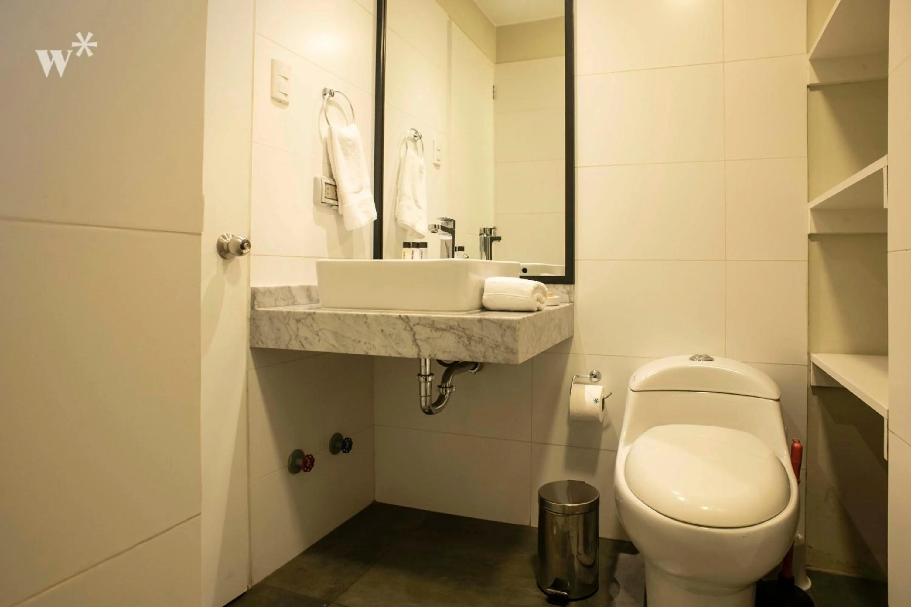 Toilet in Osma by Wynwood House