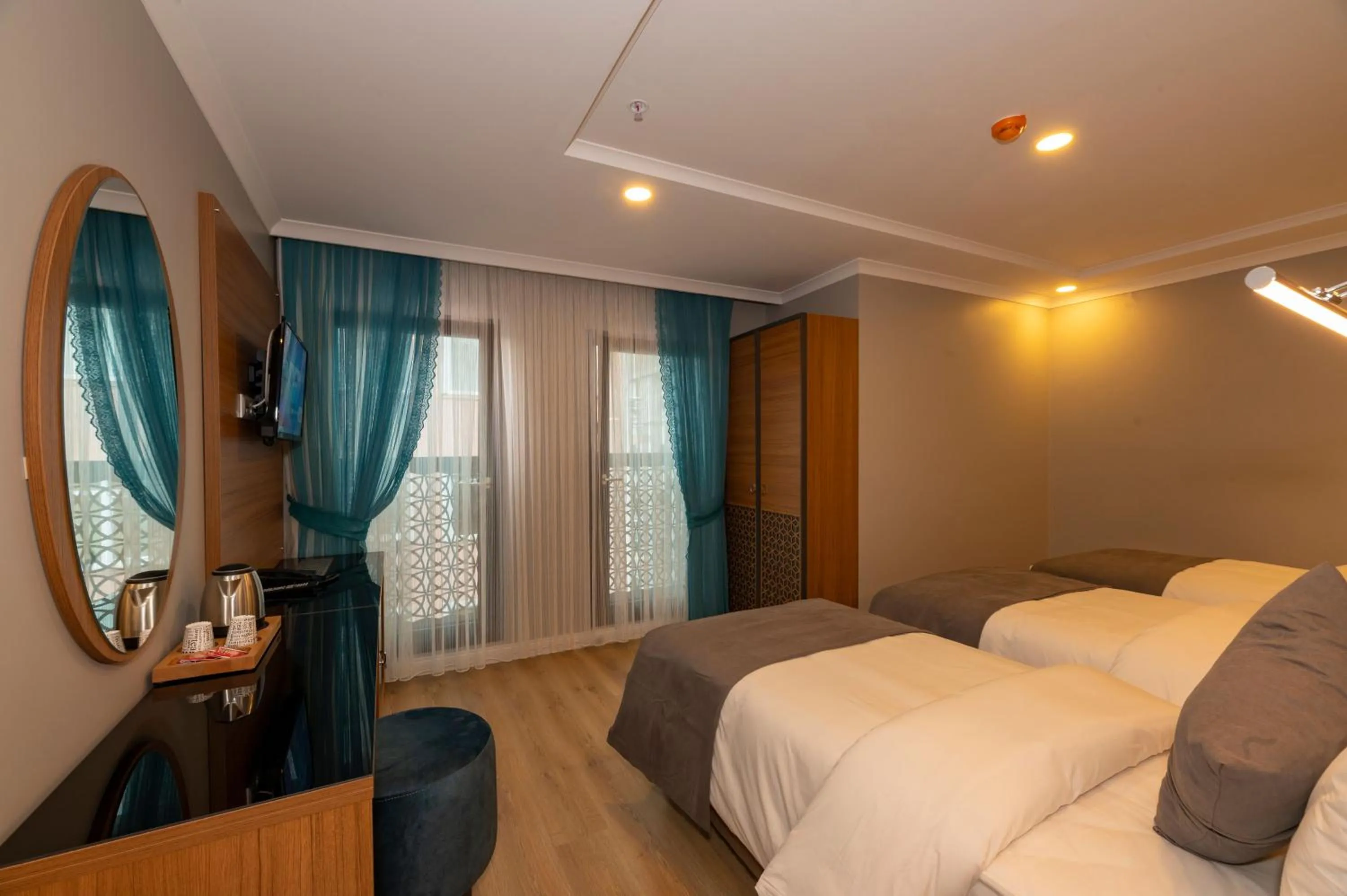 Photo of the whole room, Bed in New Emin Hotel