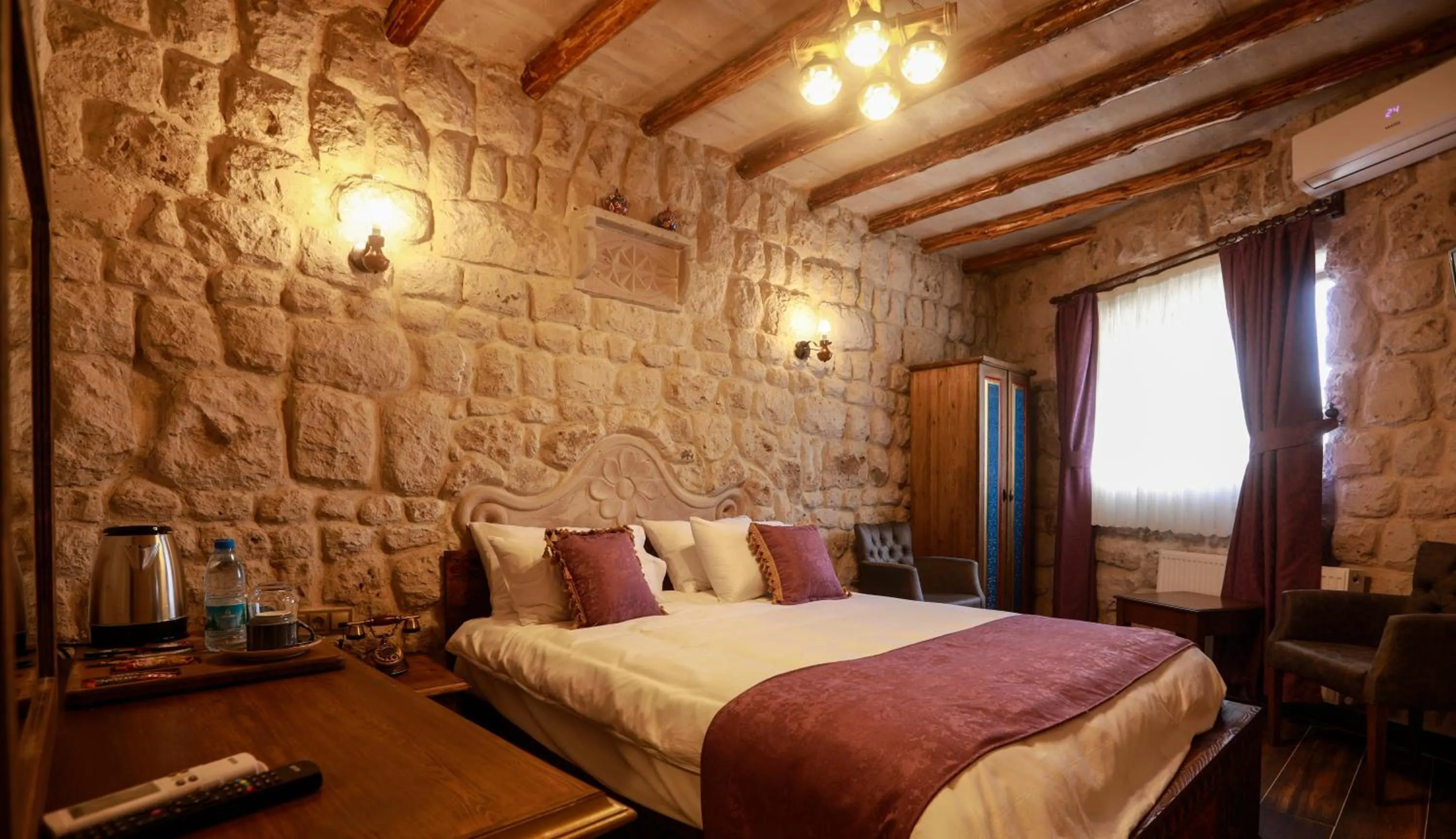 Bed in Ada Cave Suites