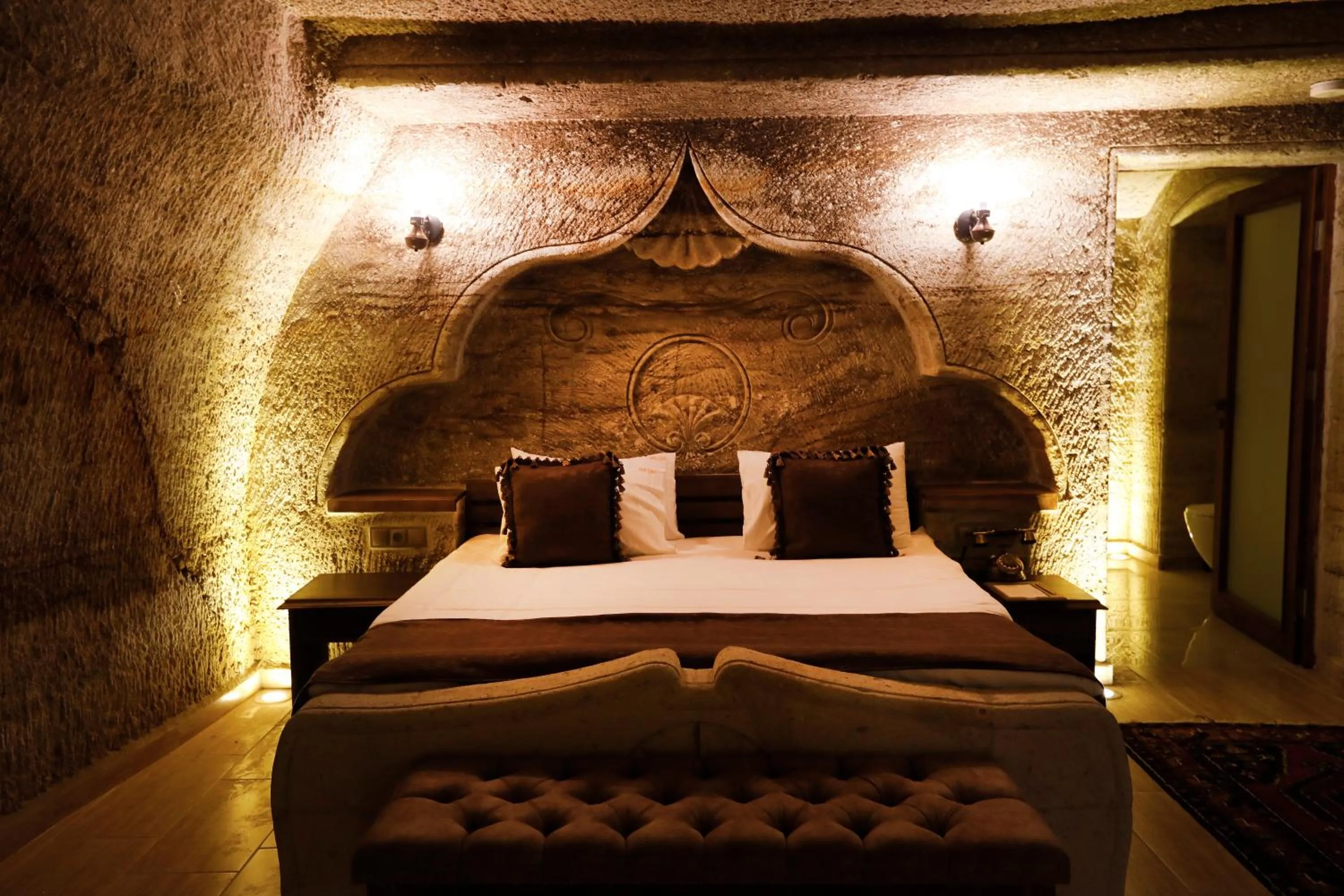 Bed in Ada Cave Suites