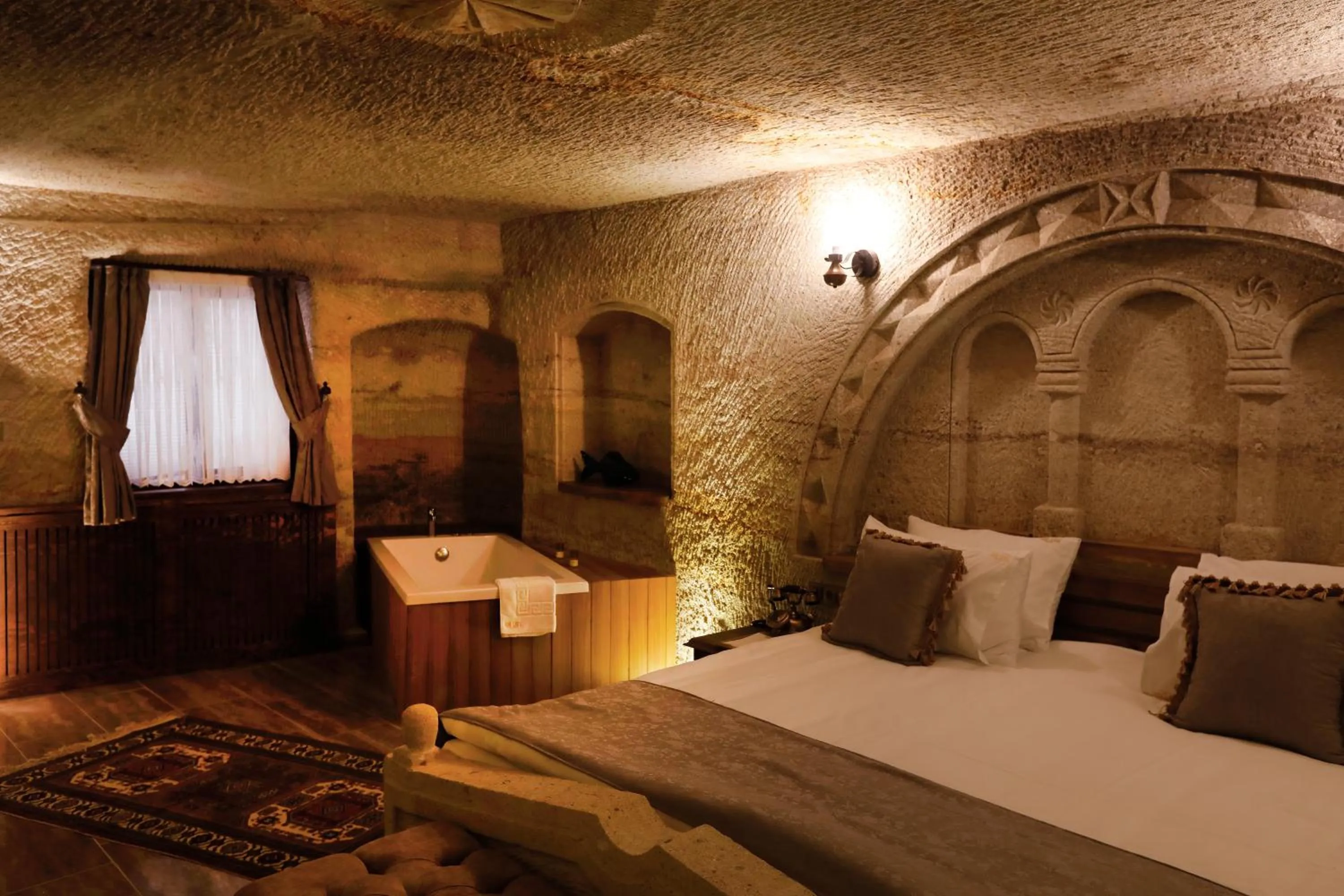 Bed in Ada Cave Suites