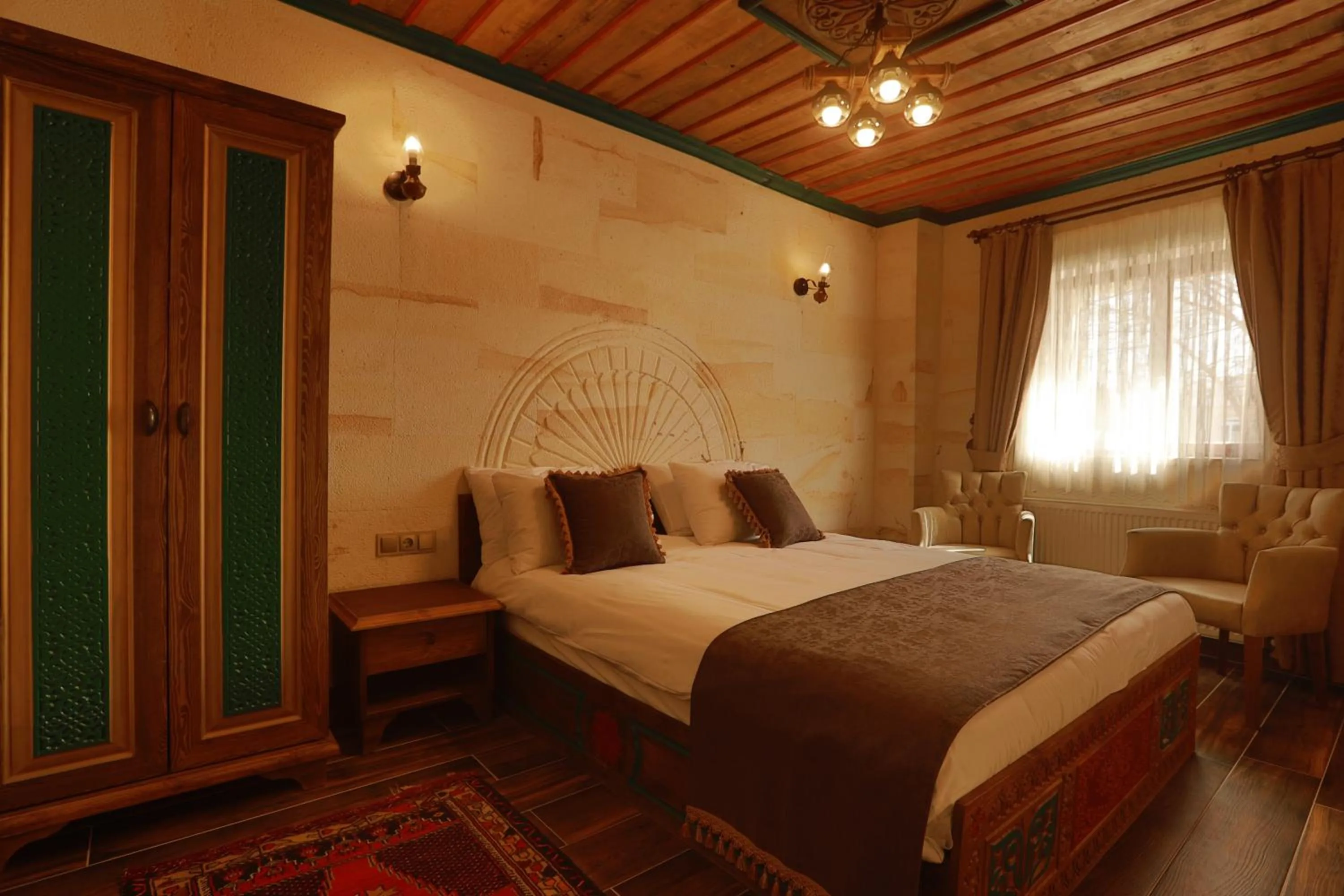 Bedroom, Bed in Ada Cave Suites
