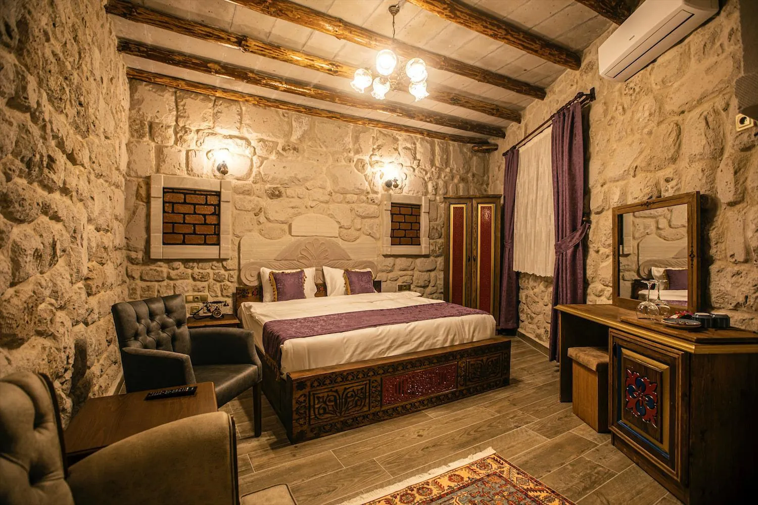 Bed in Ada Cave Suites