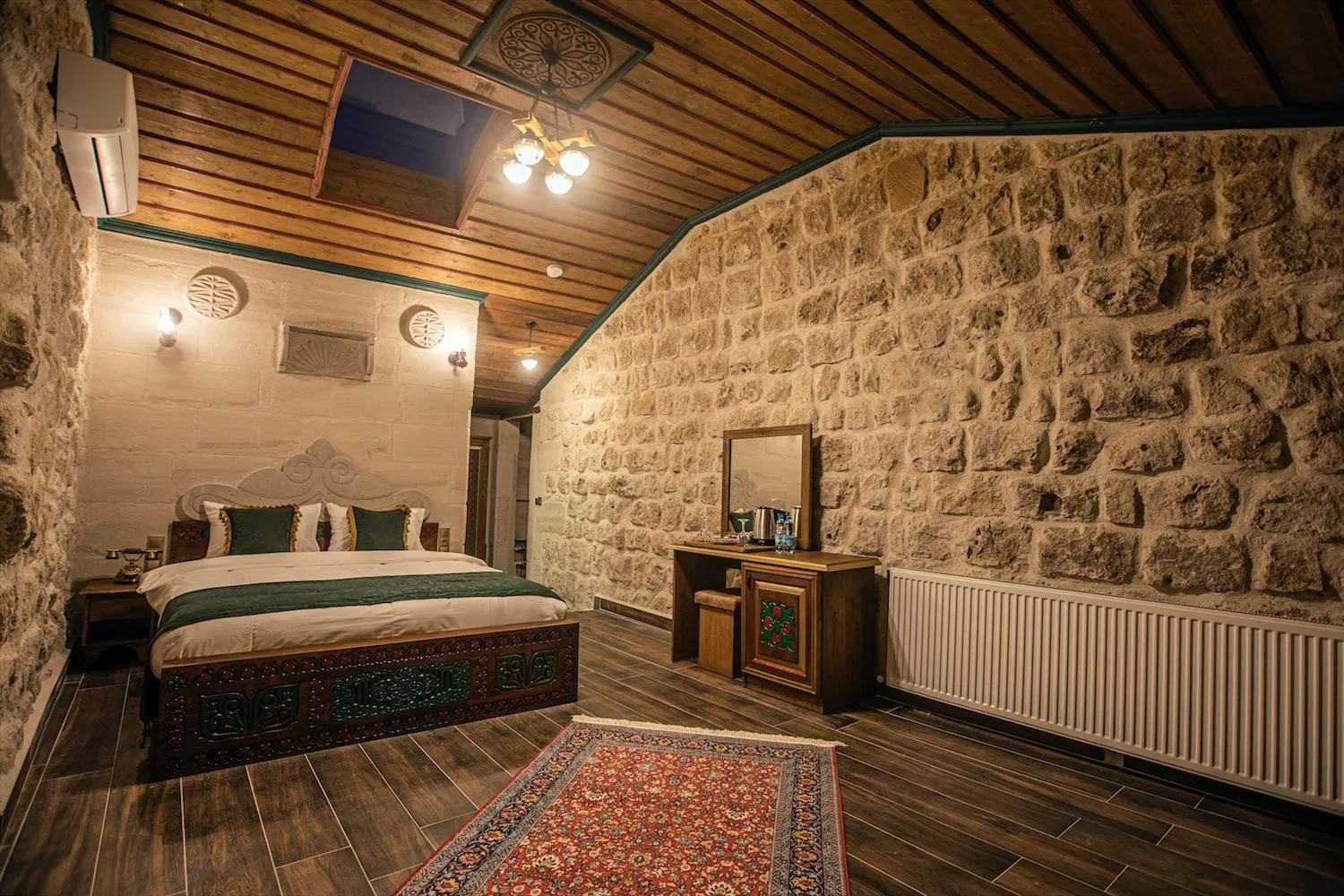 Bed in Ada Cave Suites