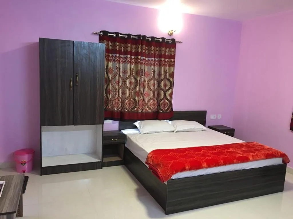 Bed in HAPPYSTAY rooms and cottages