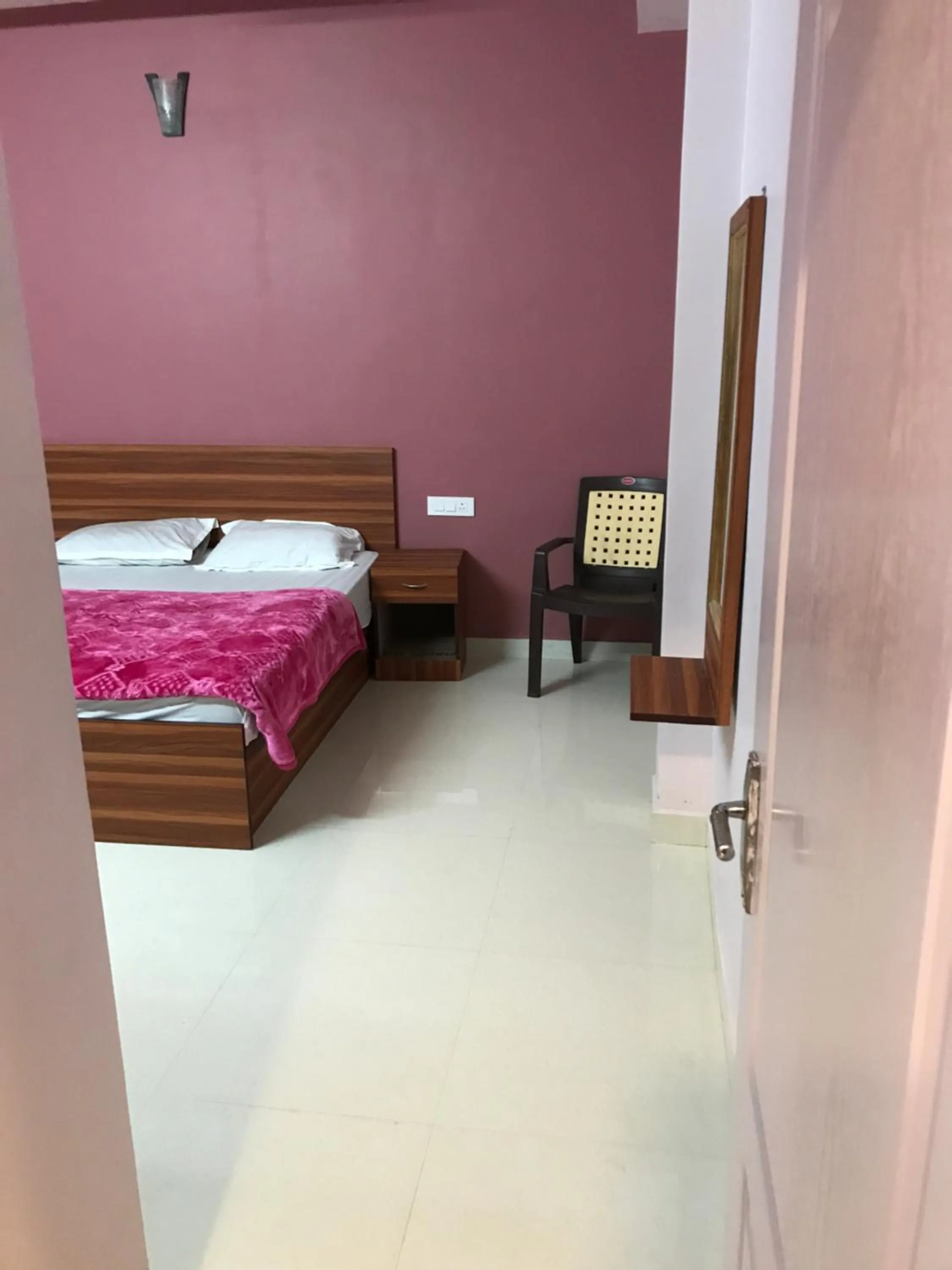 Bed in HAPPYSTAY rooms and cottages