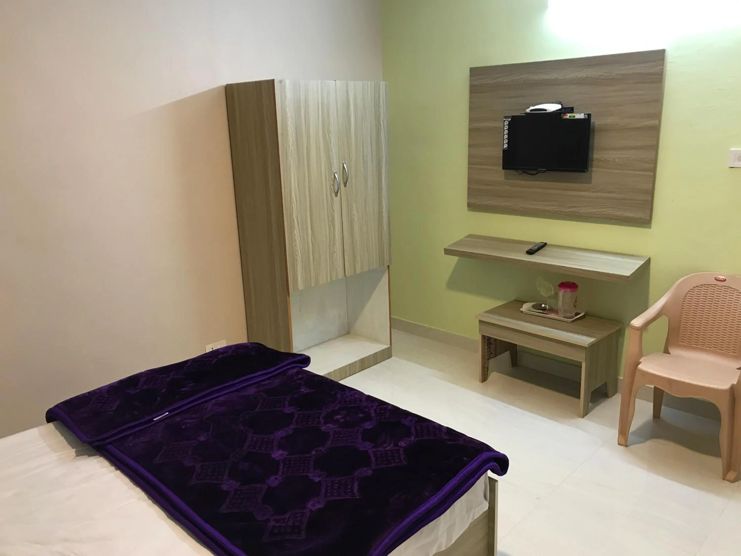 Bed in HAPPYSTAY rooms and cottages