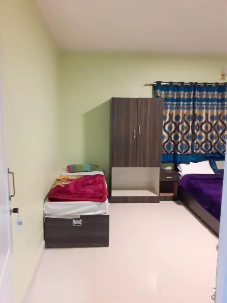 Bed in HAPPYSTAY rooms and cottages