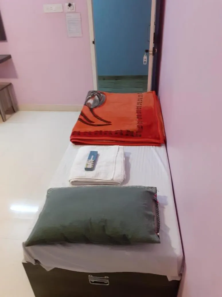 Bed in HAPPYSTAY rooms and cottages