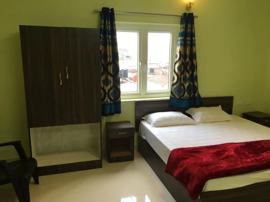 Bed in HAPPYSTAY rooms and cottages