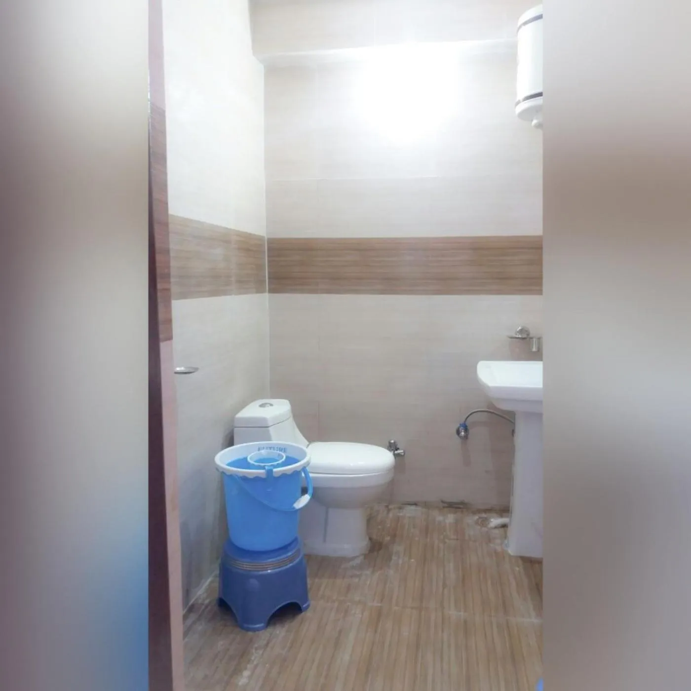 Toilet in Silver Dew Resorts and Restaurant