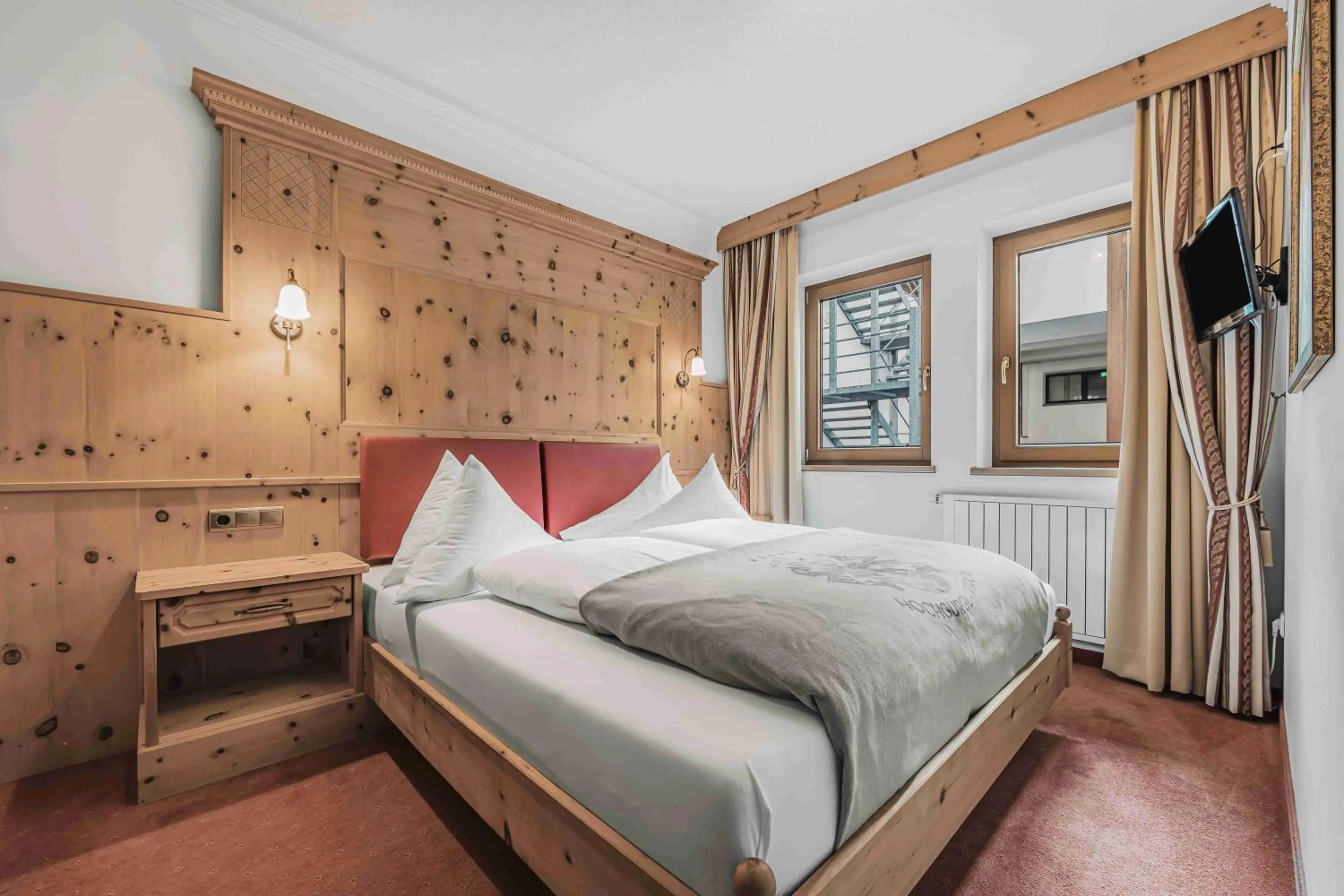 Photo of the whole room, Bed in SKI - GOLF - WELLNESS Hotel Riml