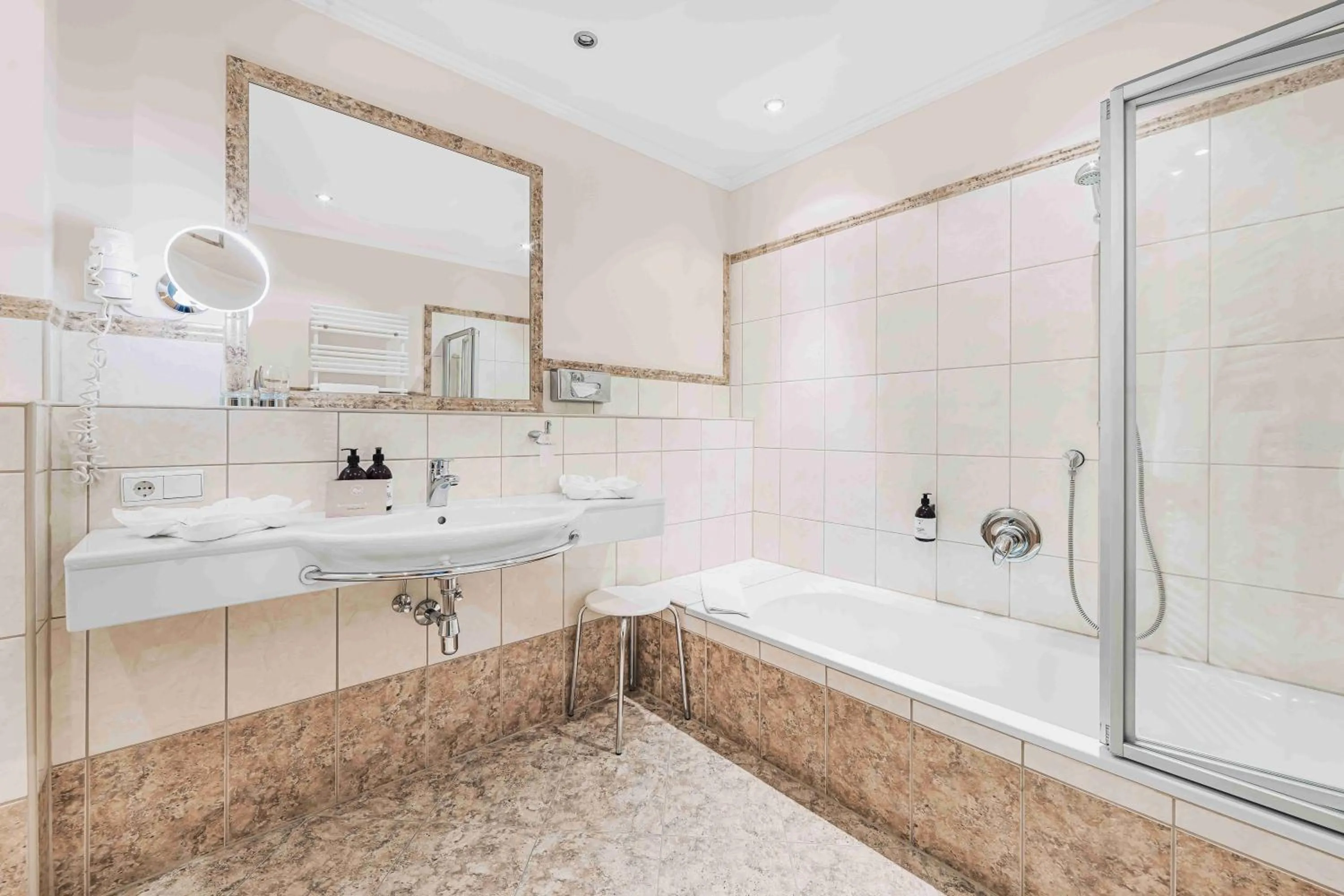 Bathroom in SKI - GOLF - WELLNESS Hotel Riml