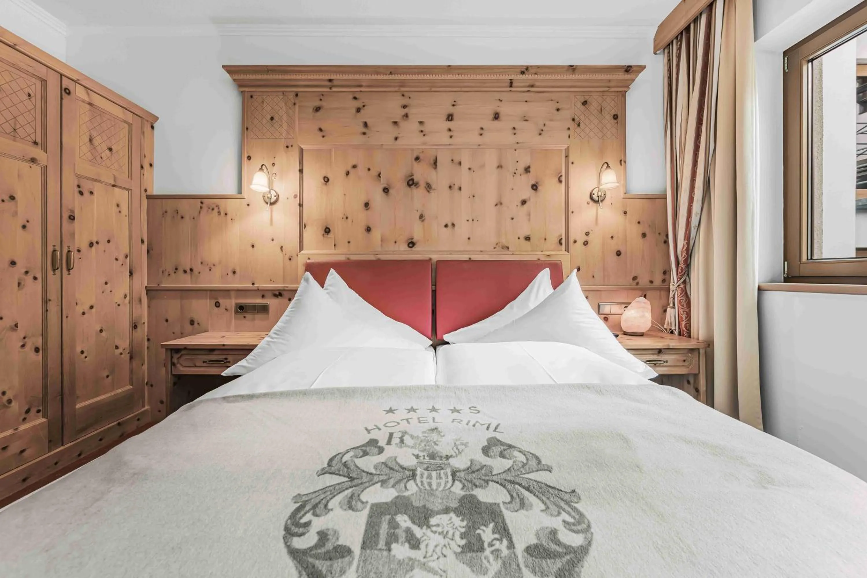 Bedroom, Bed in SKI - GOLF - WELLNESS Hotel Riml