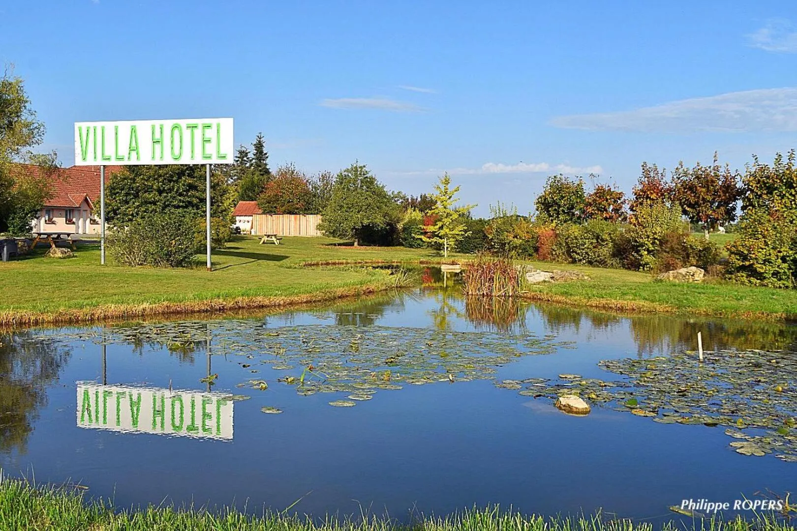 Property logo or sign in Villa Hotel