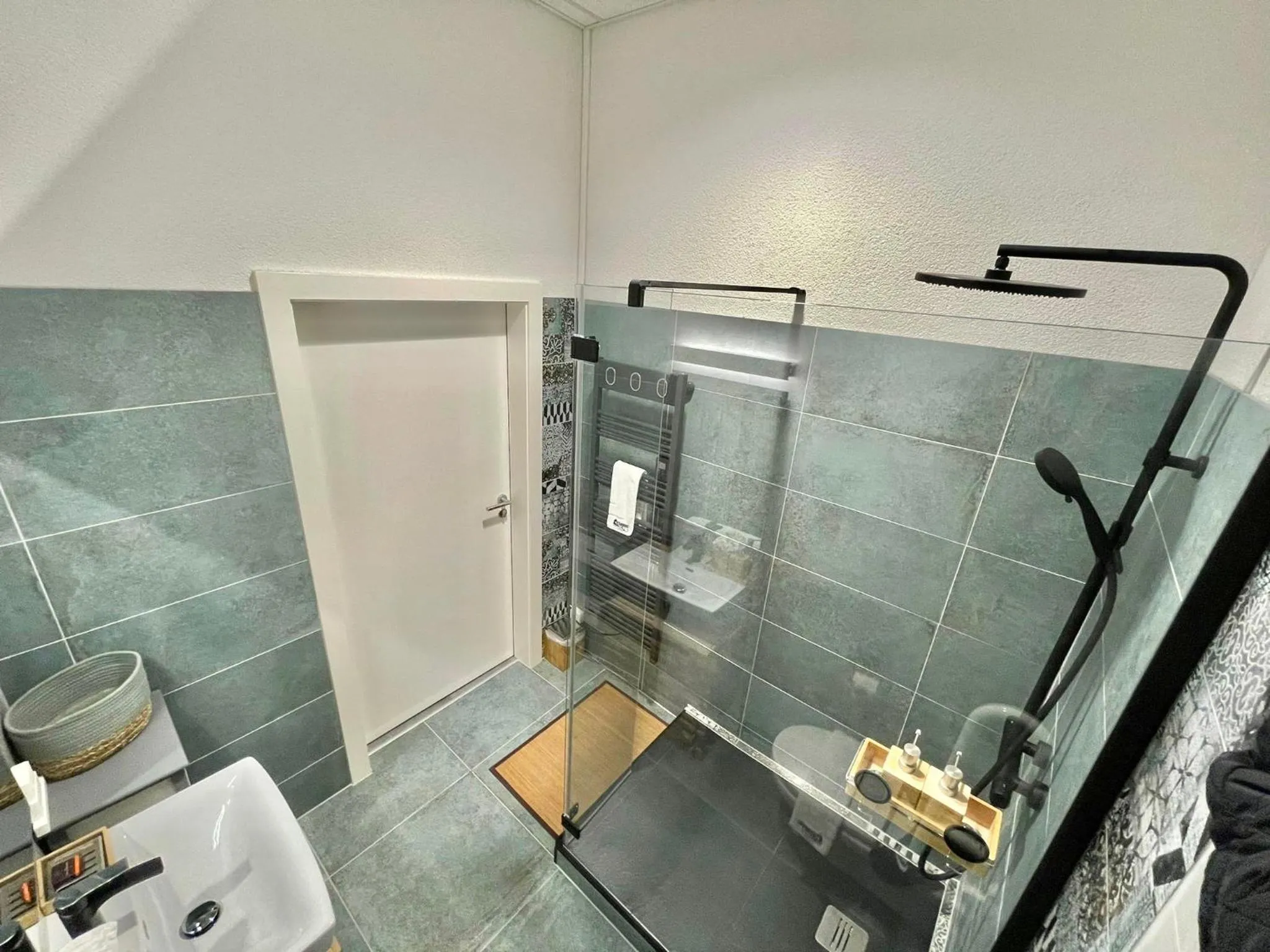 Bathroom in The 5 Continents I by Stay Swiss