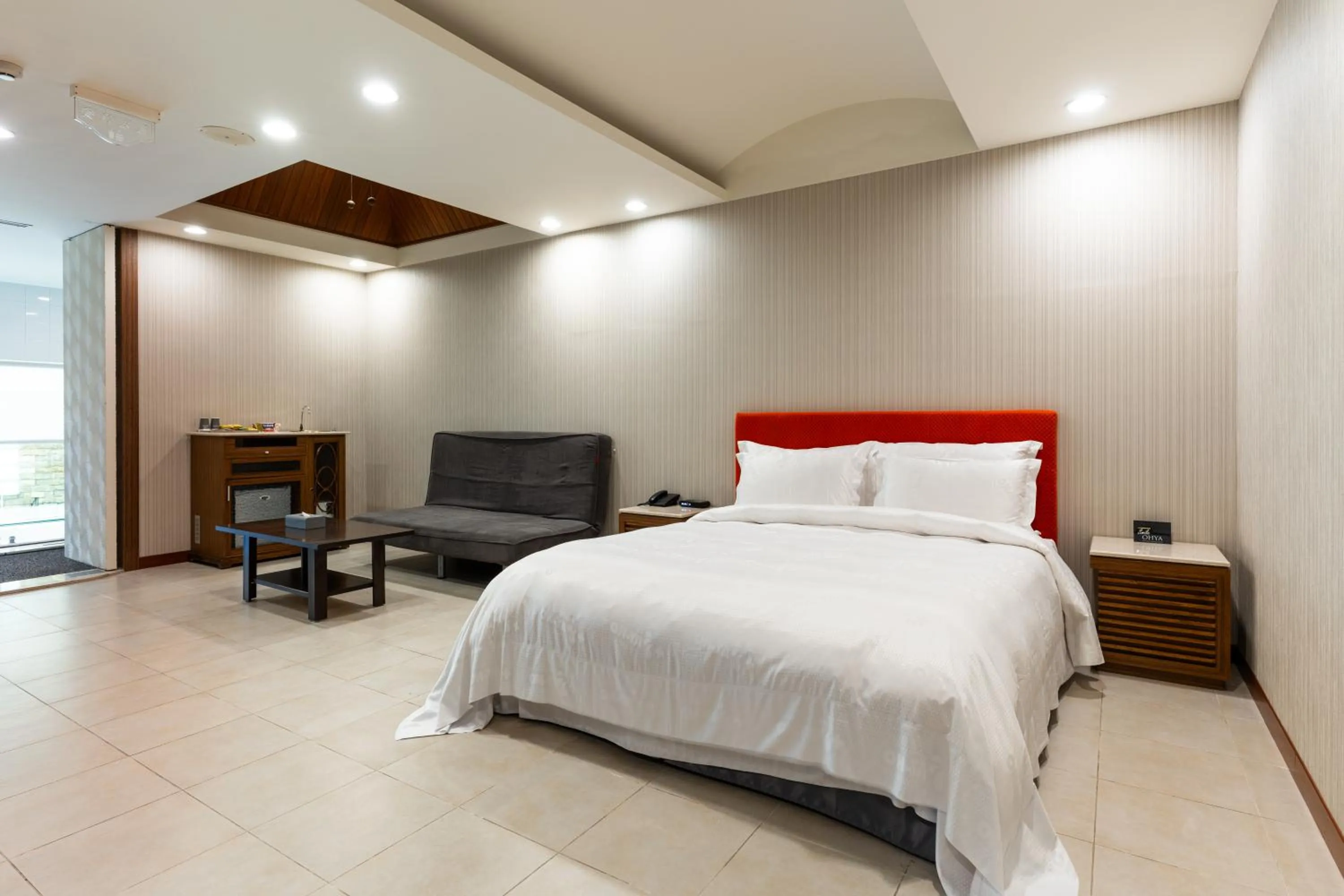 Bed in OHYA Chain Boutique Motel-Xinying