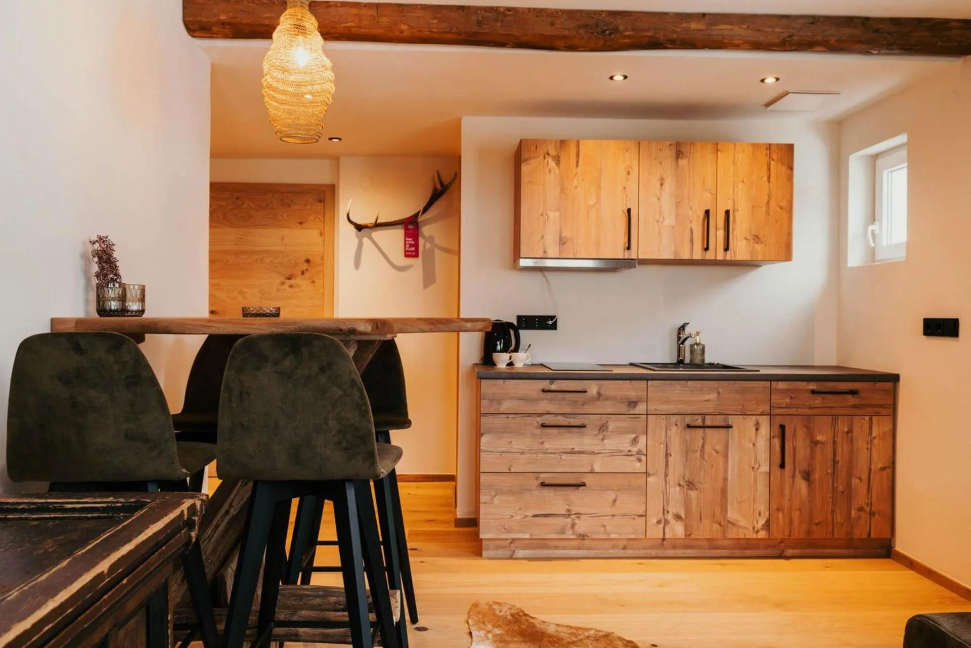 Kitchen or kitchenette in Hotel Glücksschmiede - Hinterglemm