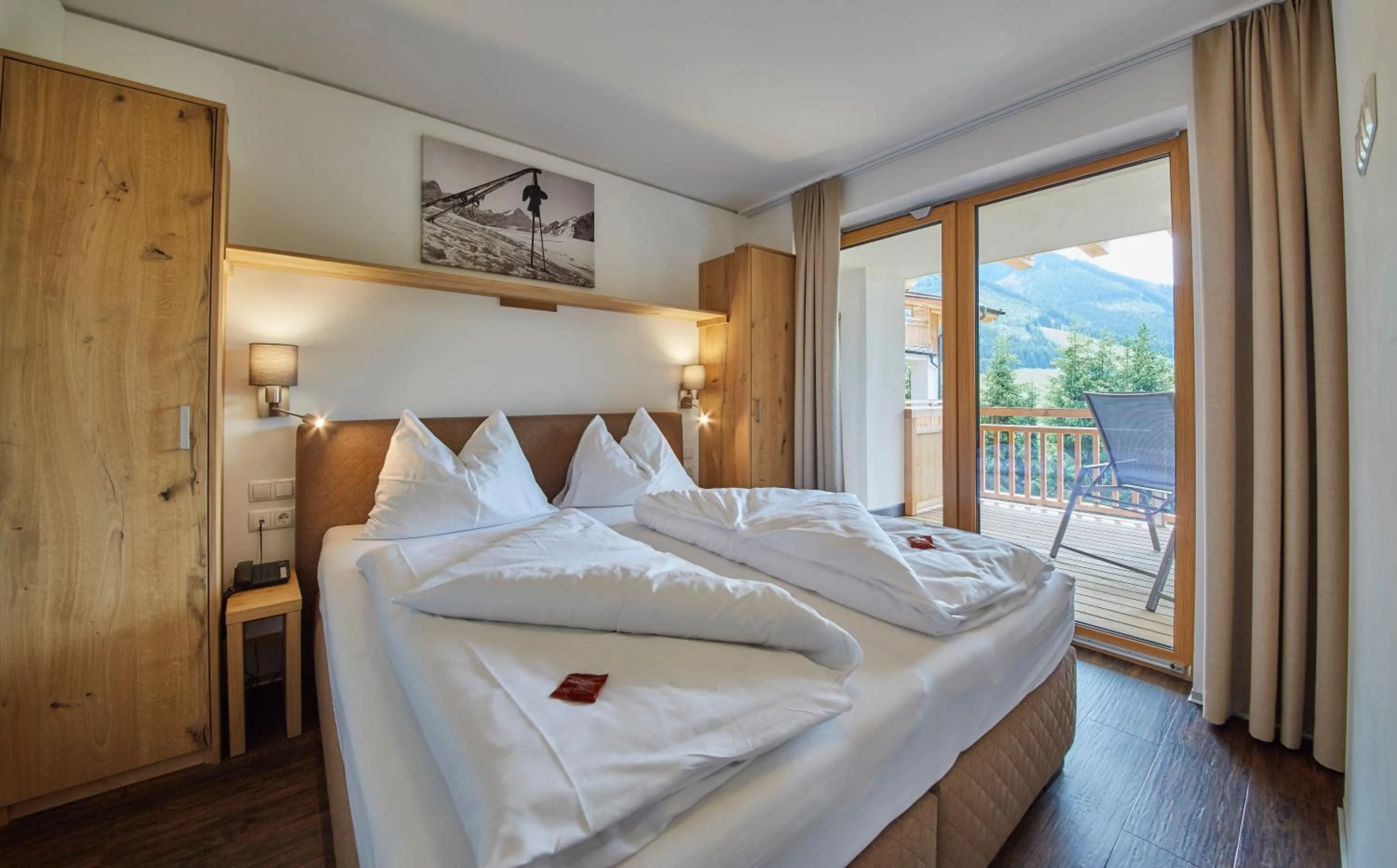 Bedroom, Bed in AlpenParks Hotel & Apartment Sonnleiten