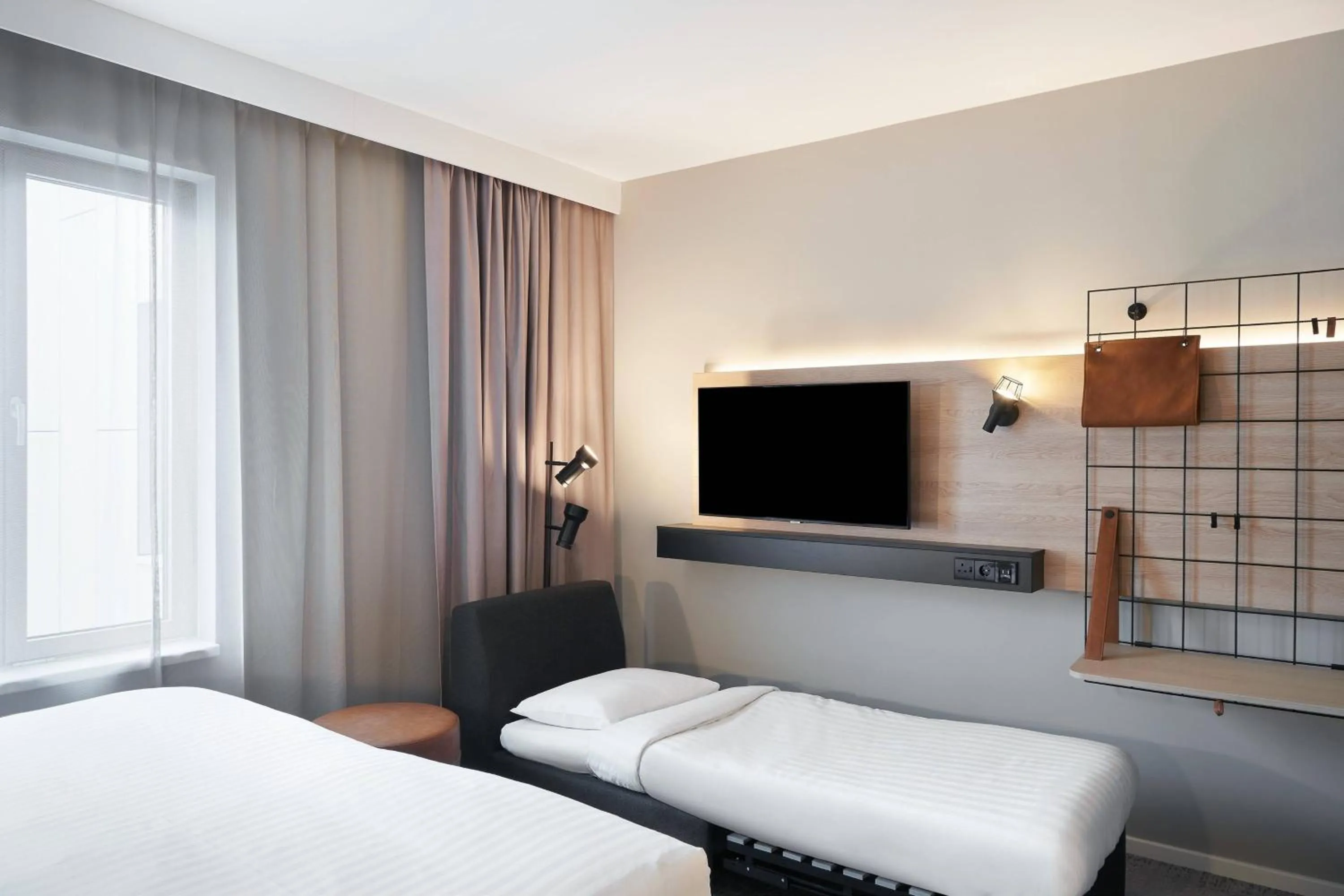 Photo of the whole room, Bed in Moxy Edinburgh Fountainbridge