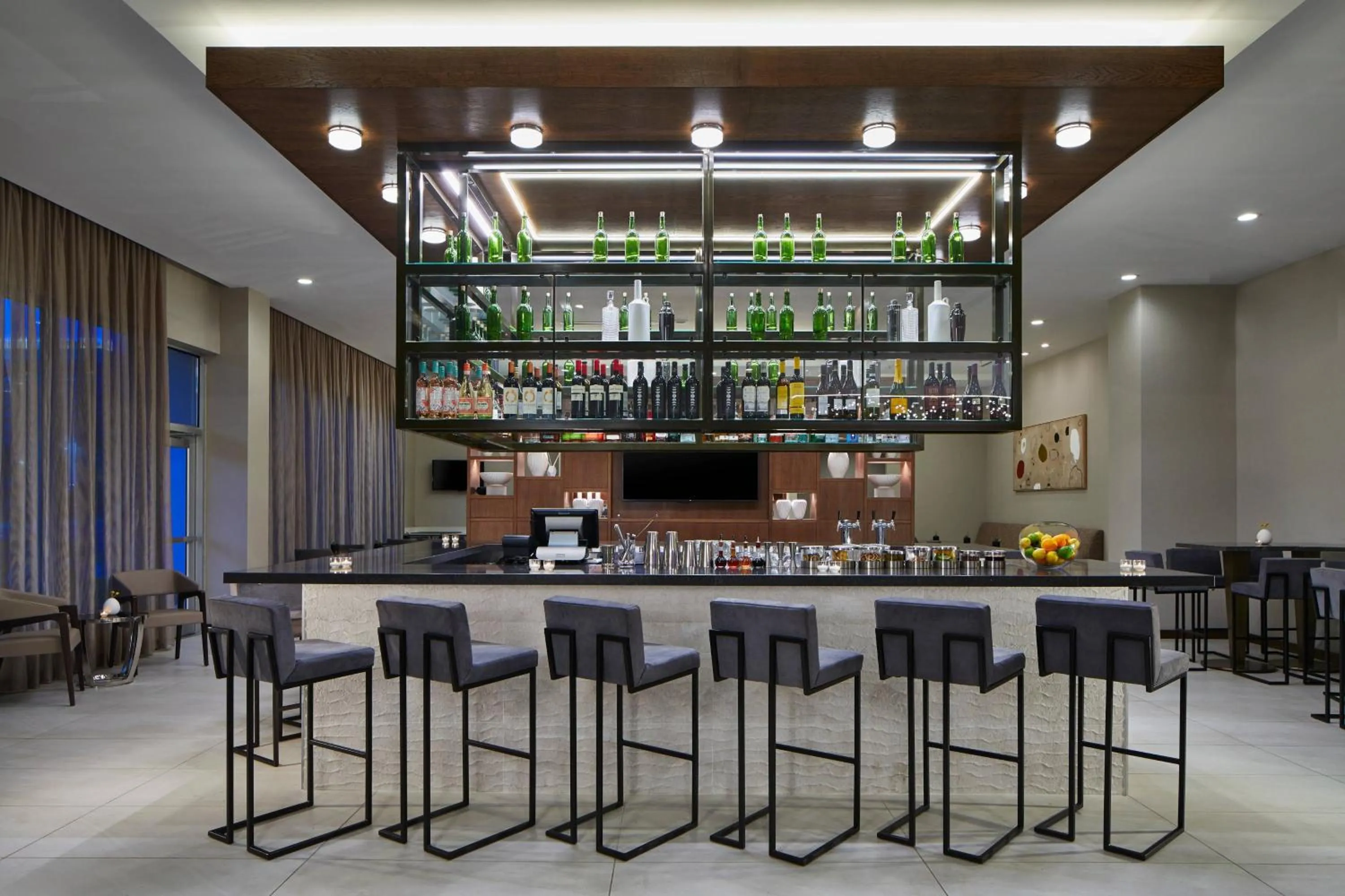 Lounge or bar in AC Hotel by Marriott Tuscaloosa Downtown