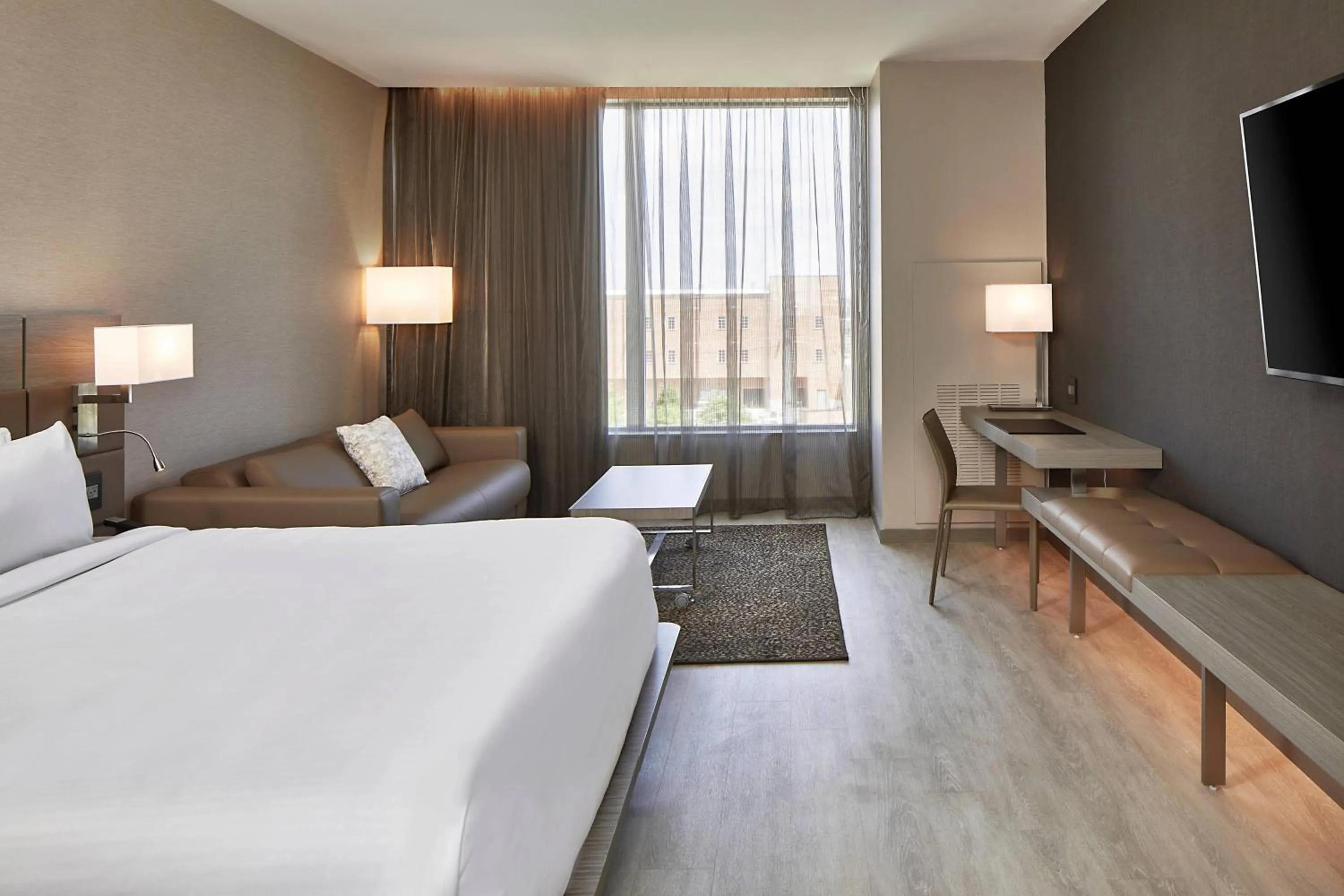 Photo of the whole room, Bed in AC Hotel by Marriott Tuscaloosa Downtown