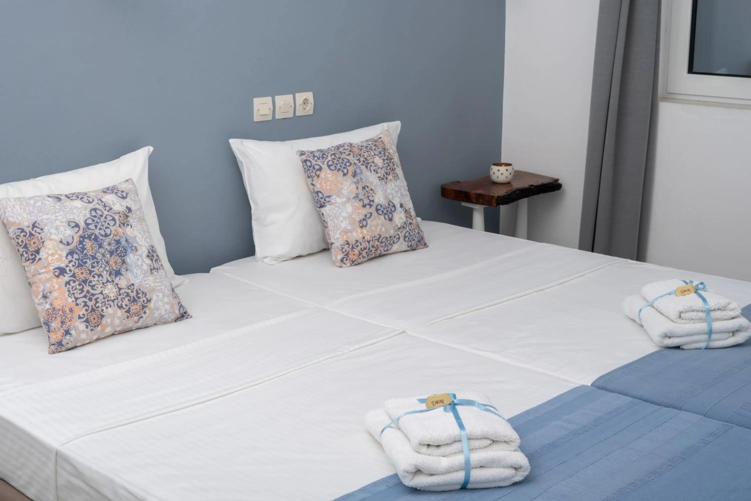 Bed in Aegean Apartments