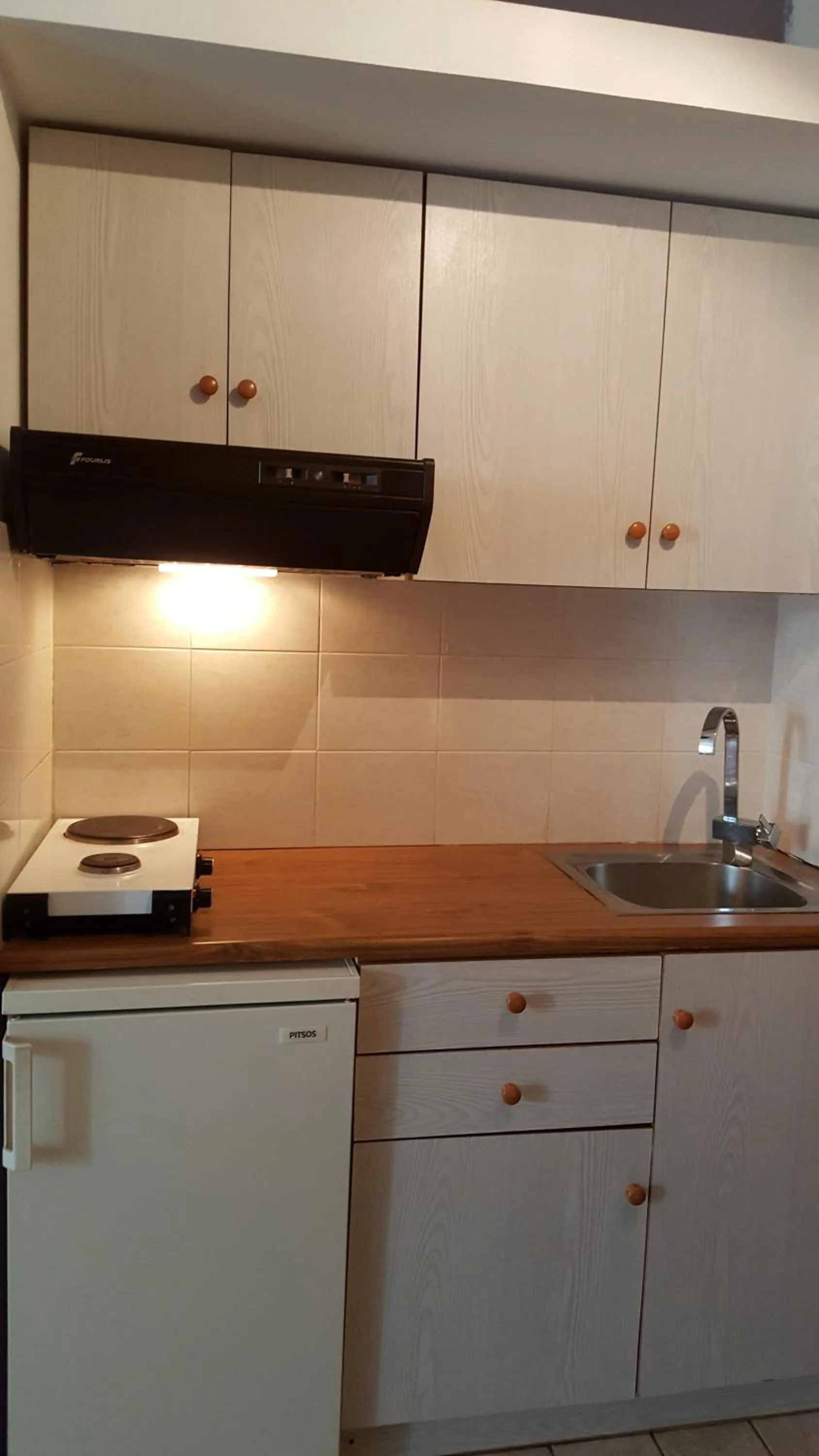 Kitchen or kitchenette in Aegean Apartments