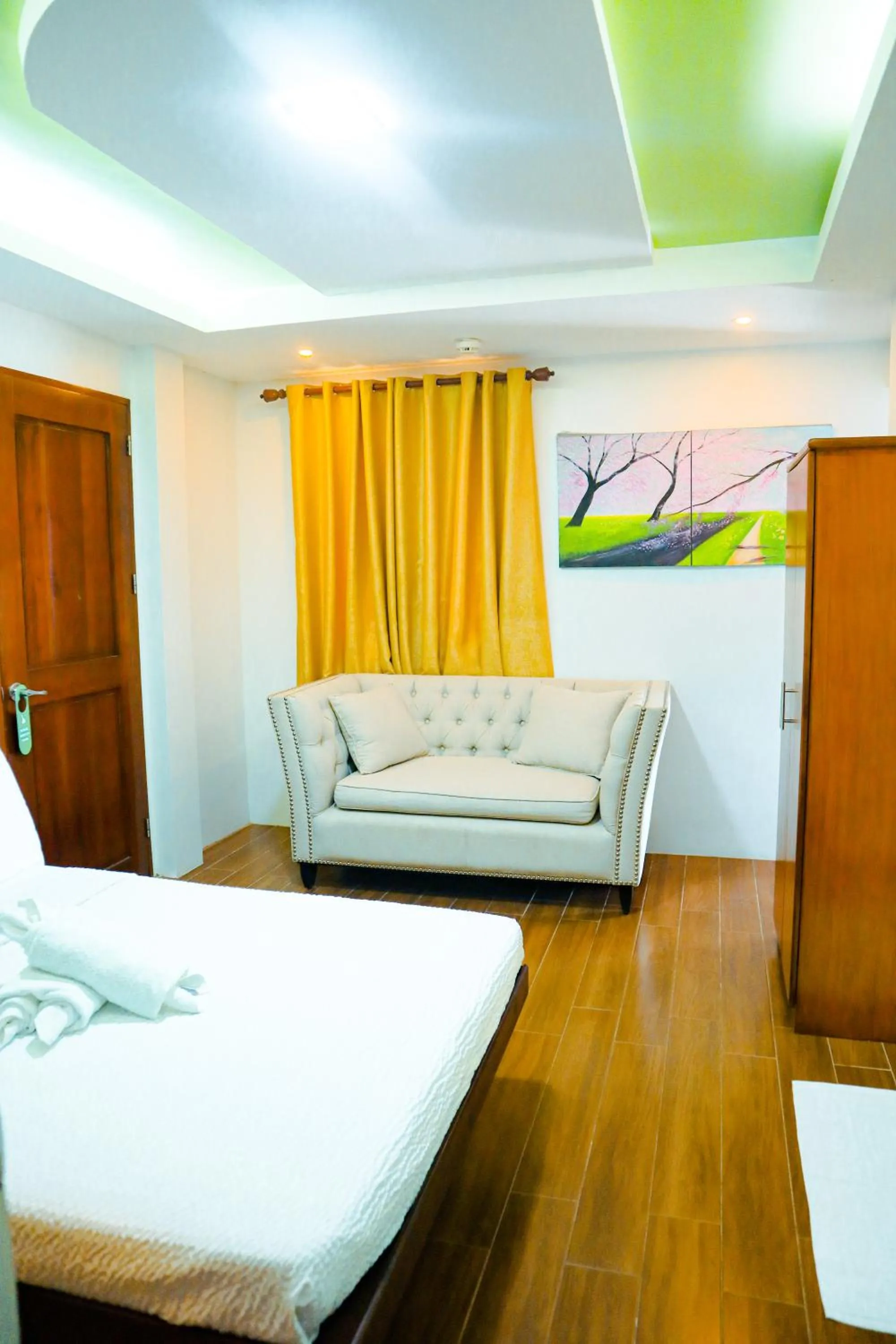 Seating area, Bed in Youhan Beach Resort